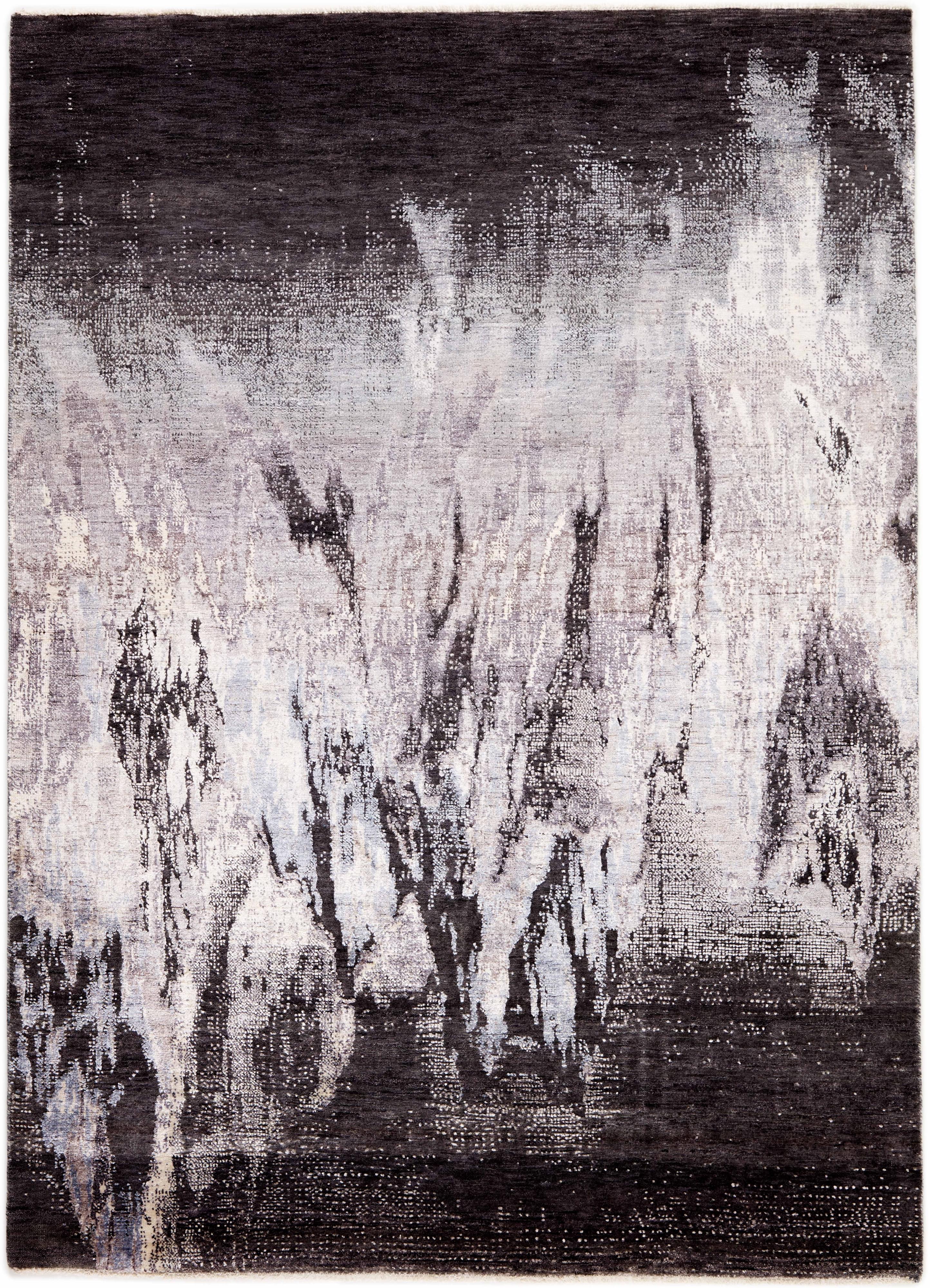 Large area rug with abstract design in cream and black