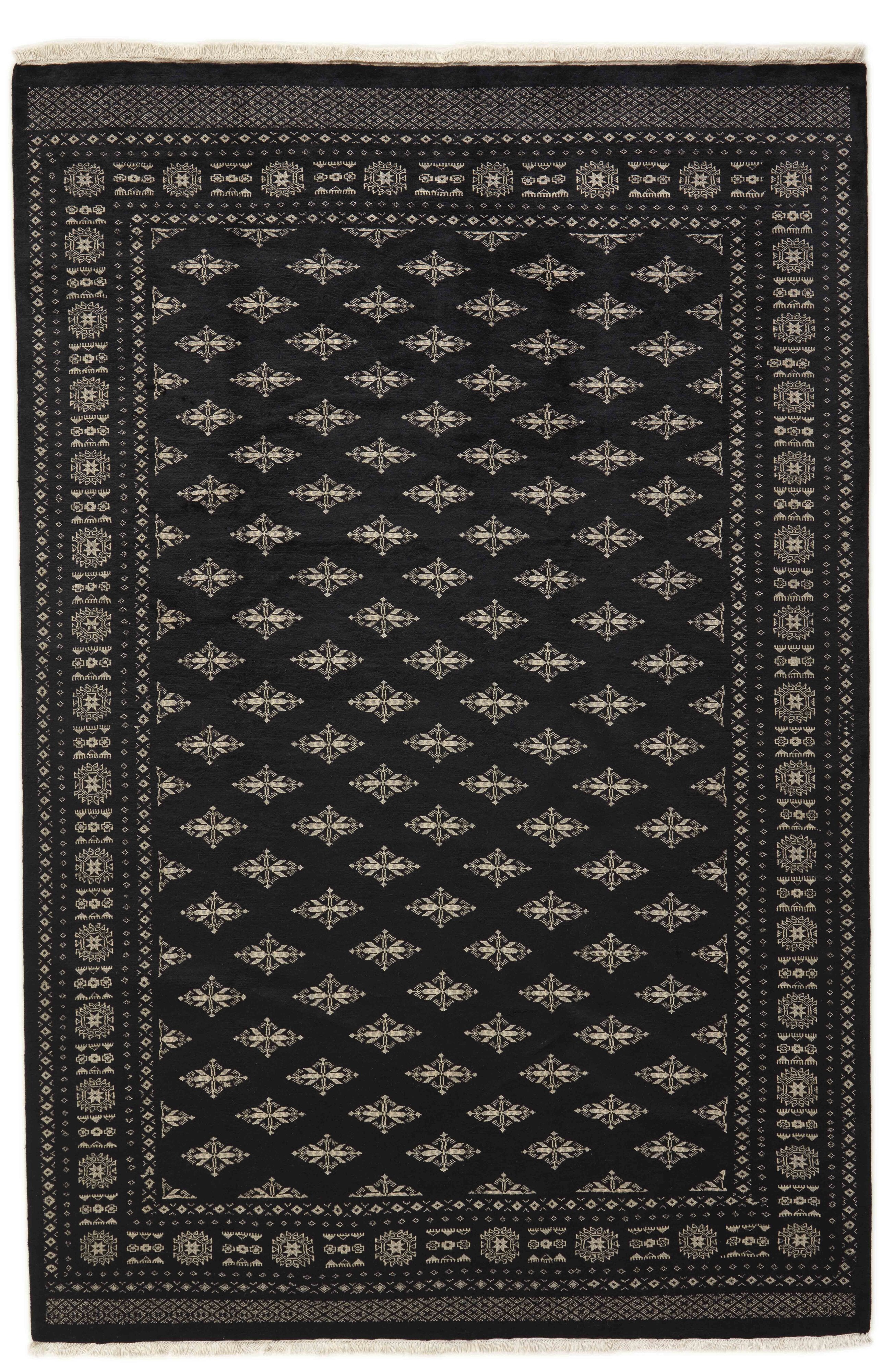 Black Oriental rug with traditional bordered pattern