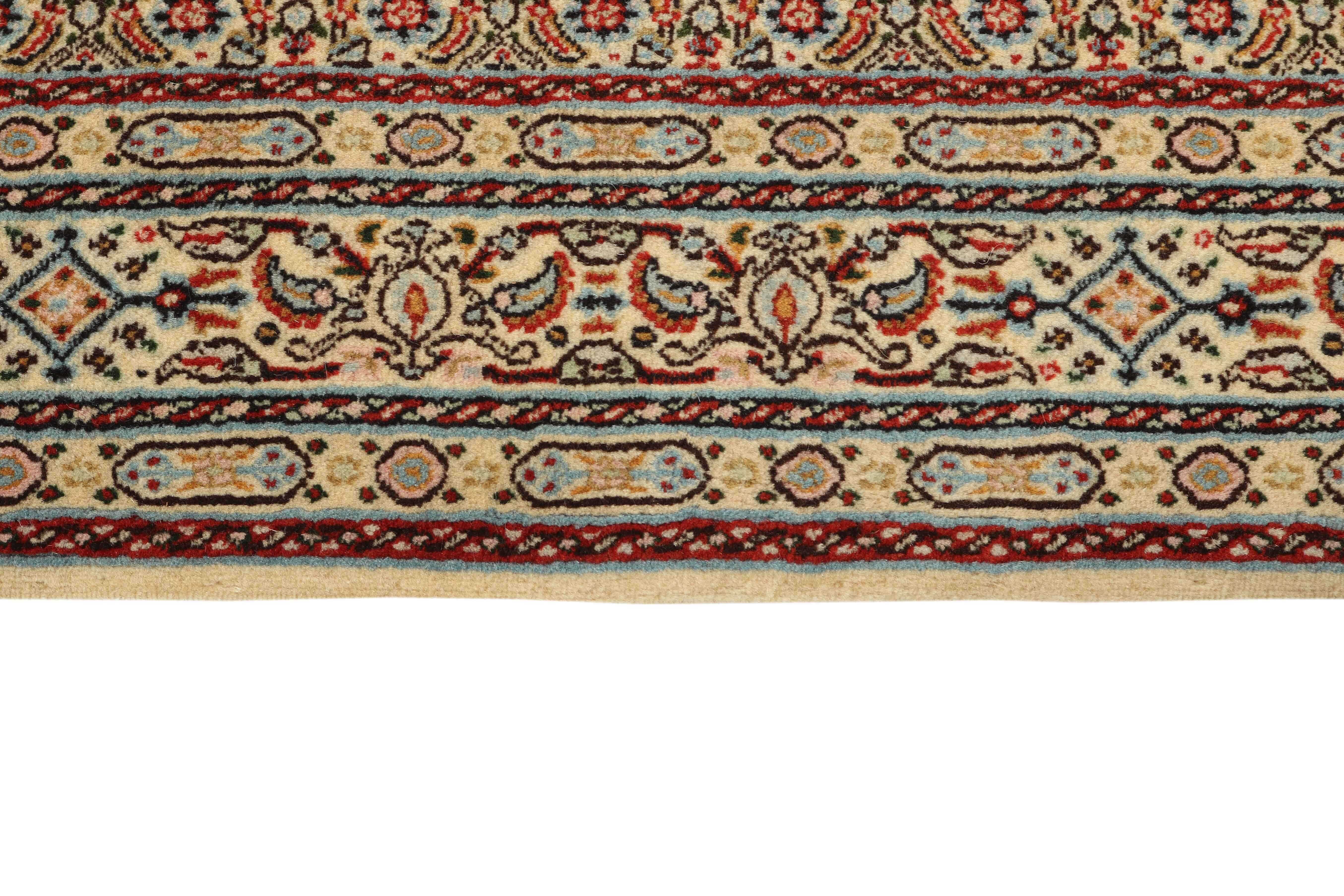 authentic persian rug with traditional floral pattern in beige