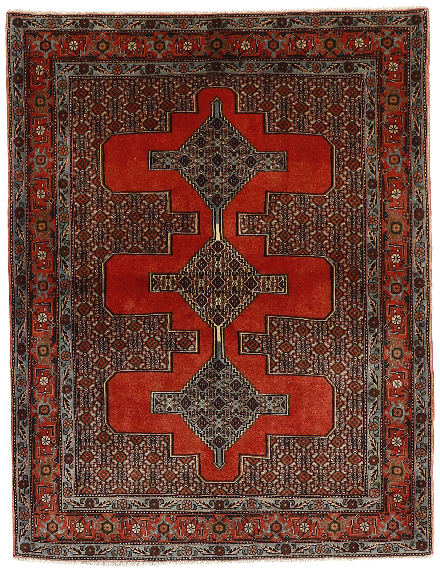 authentic persian rug with a traditional geometric design in red