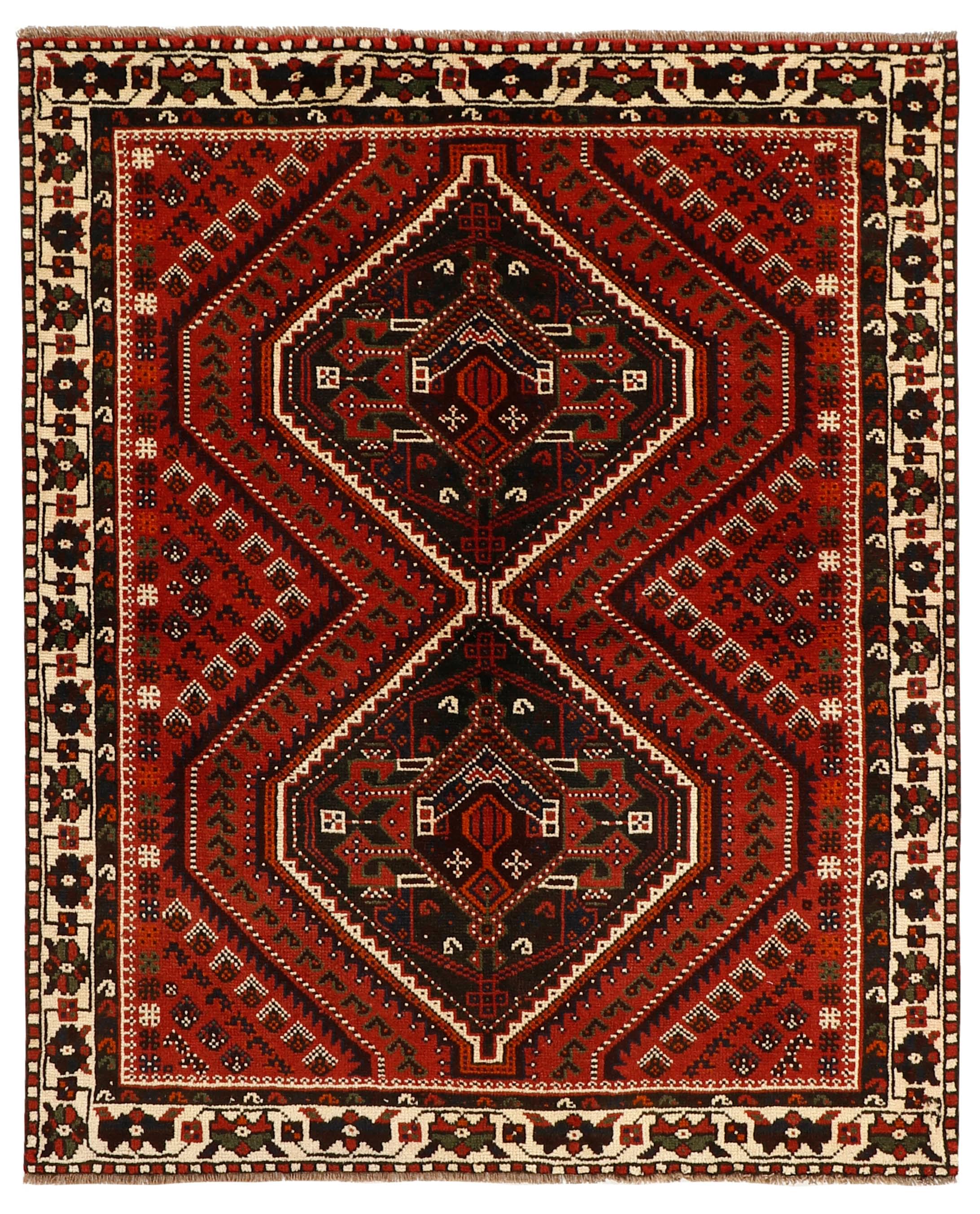 Authentic persian rug with a traditional tribal geometric pattern in red