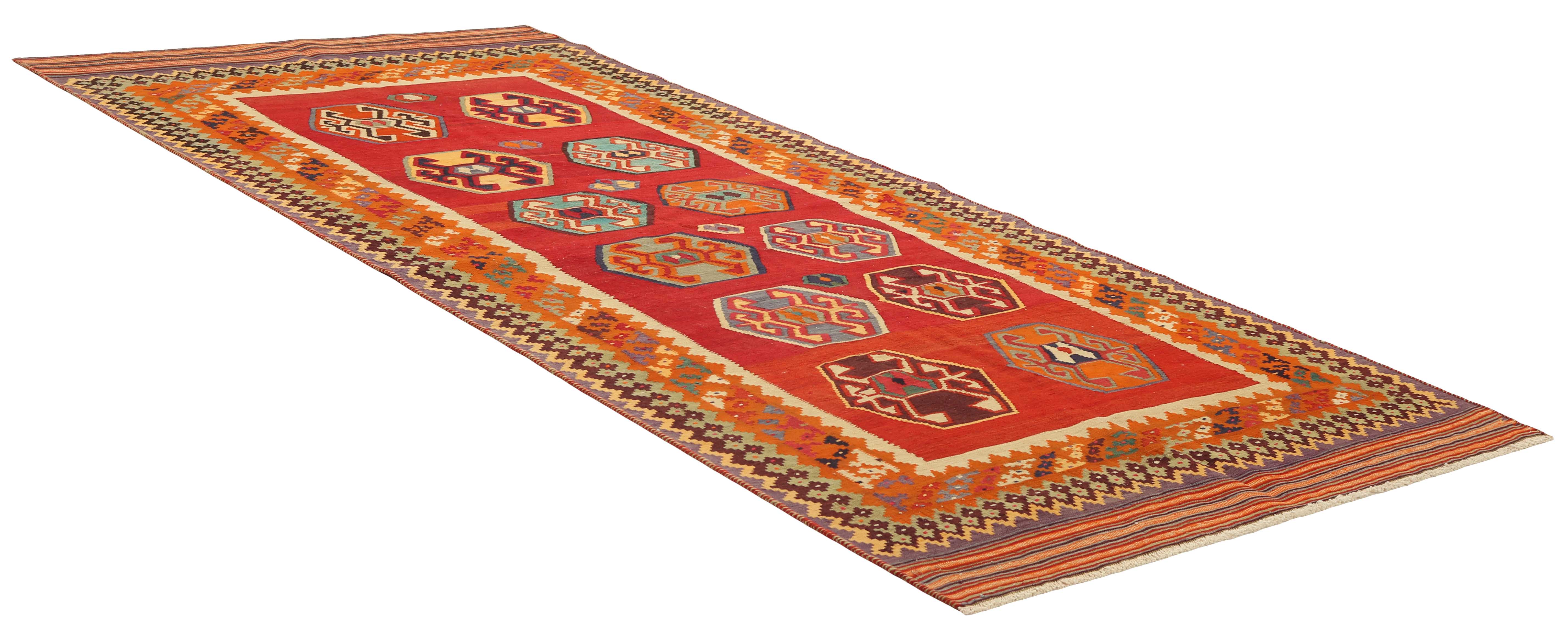 Authentic persian kelim flatweave rug with traditional stripe design in multicolour