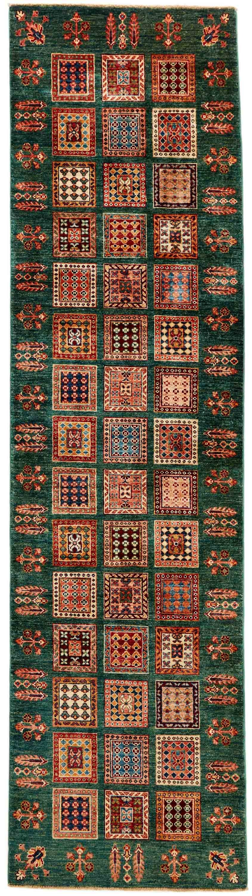 Authentic oriental runner with traditional pattern in red, orange, yellow, blue, green, beige and brown