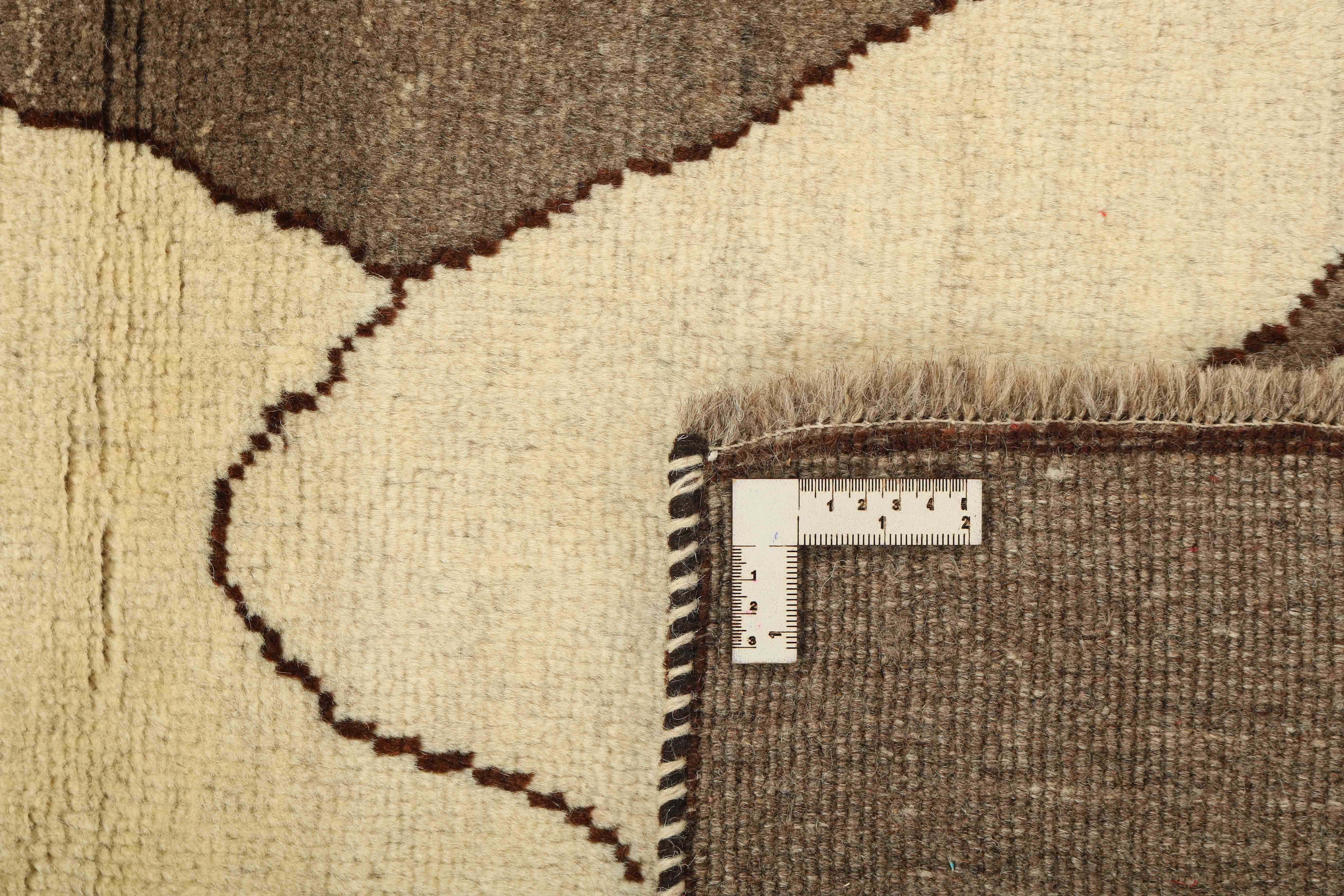 brown persian rug with figural design