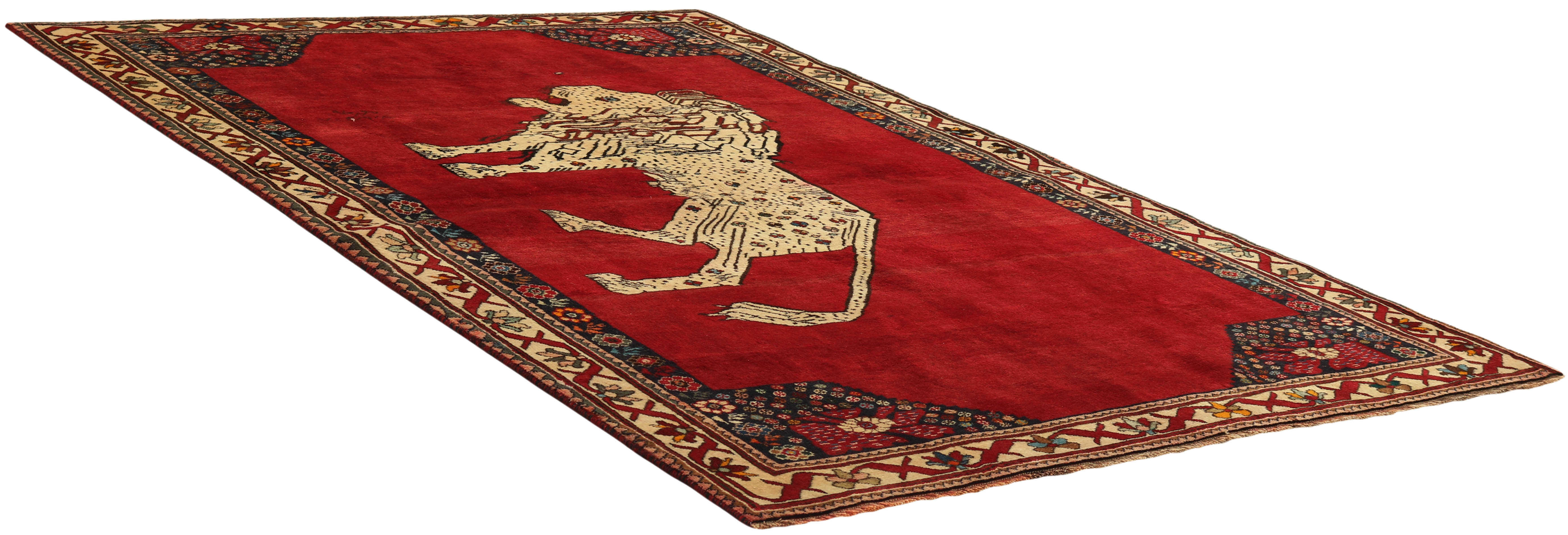 red persian rug with figural design