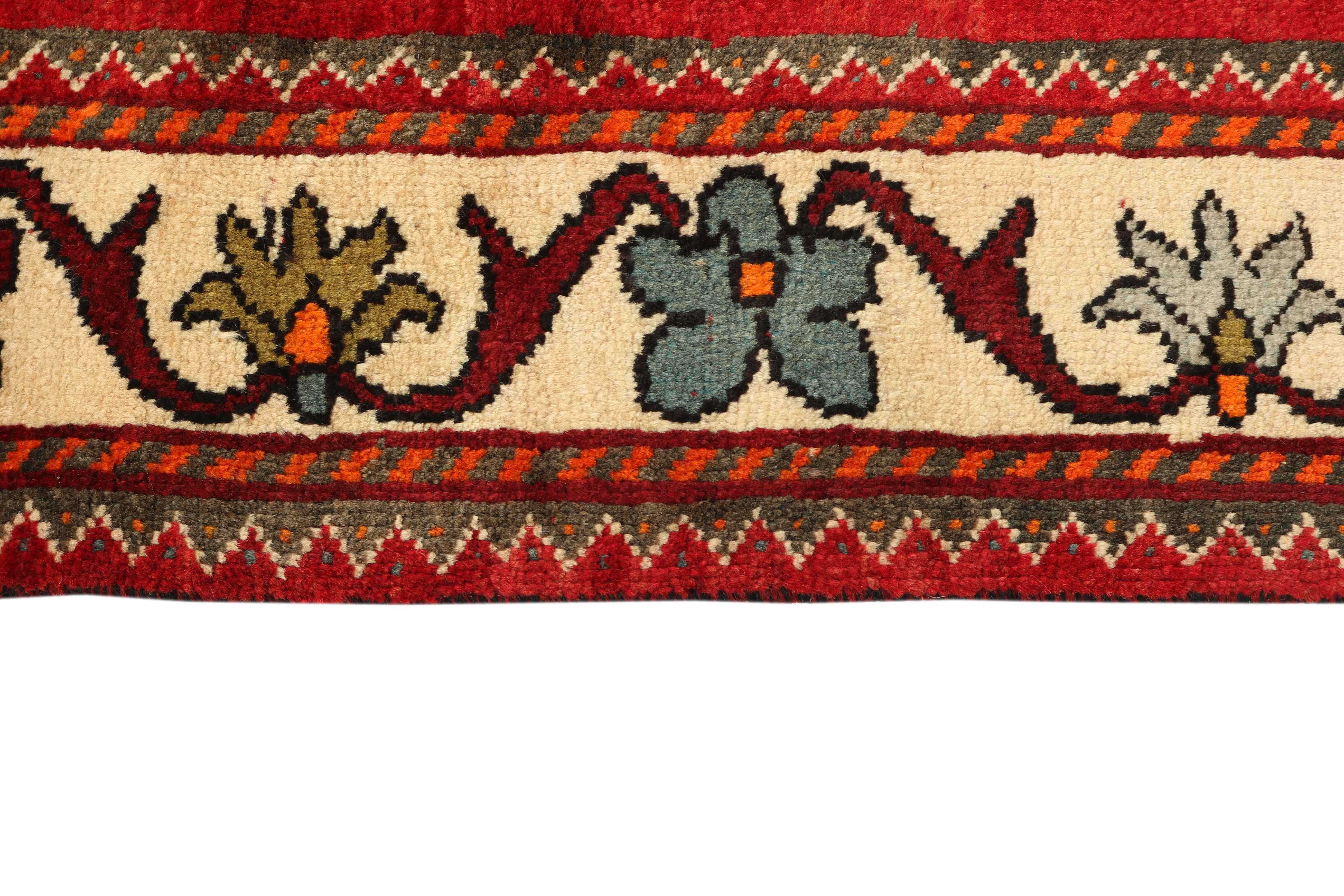 red persian rug with figural design