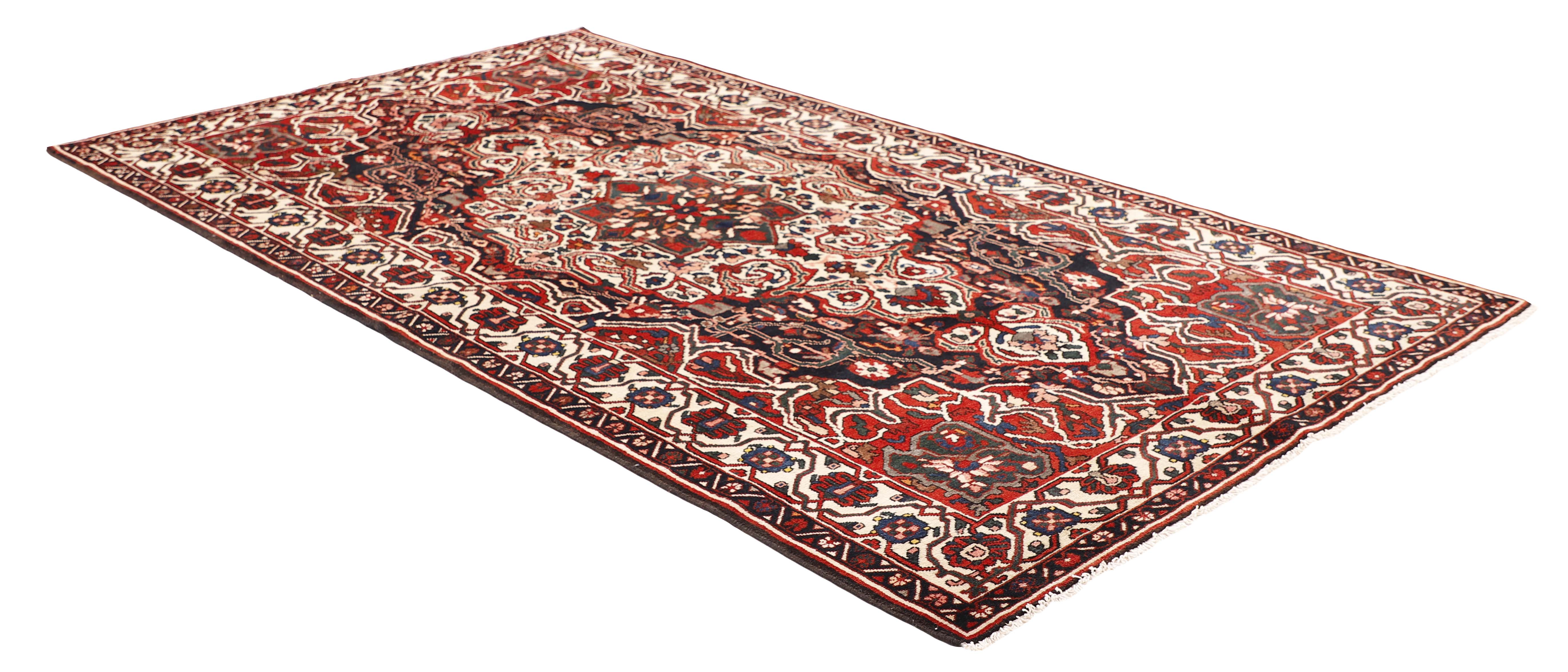 Authentic persian rug with traditional pattern in red