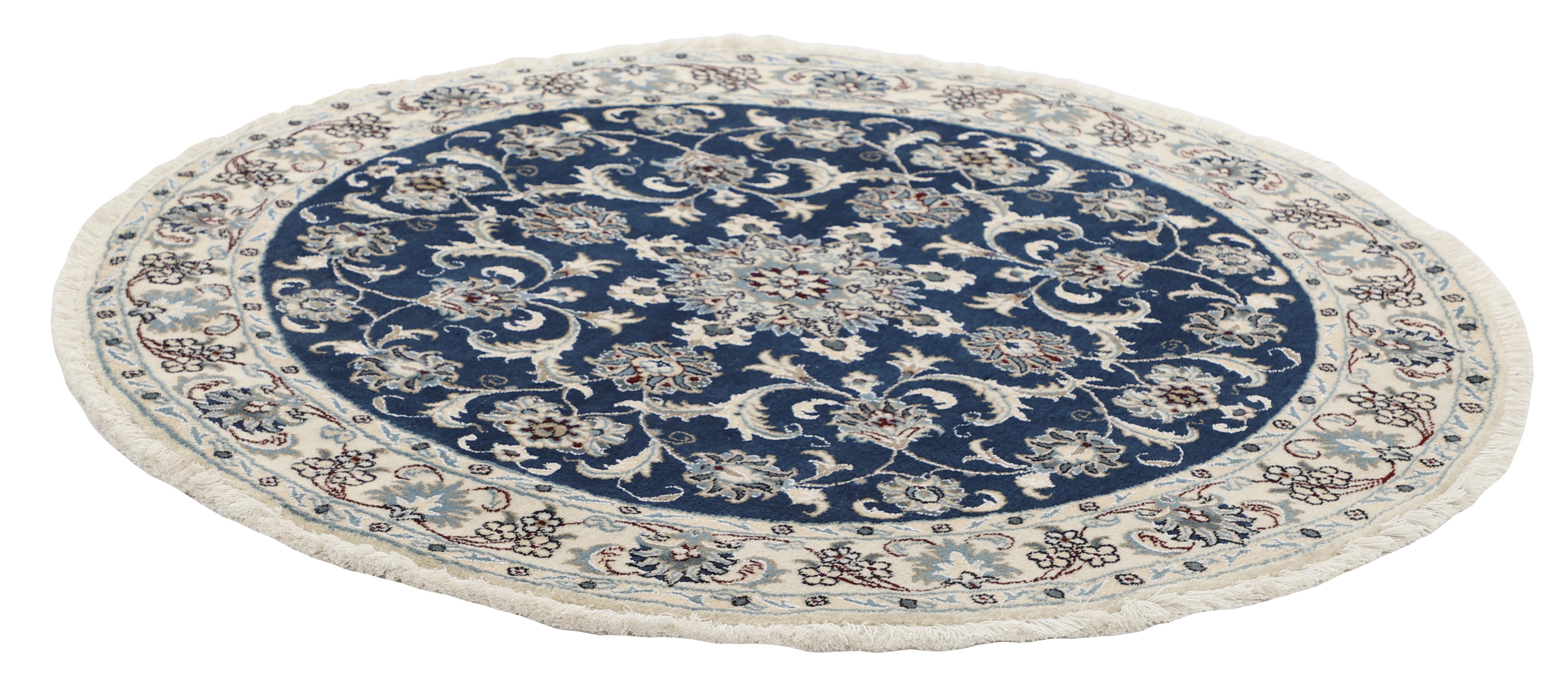 Authentic persian circle rug with a traditional floral design in cream and blue