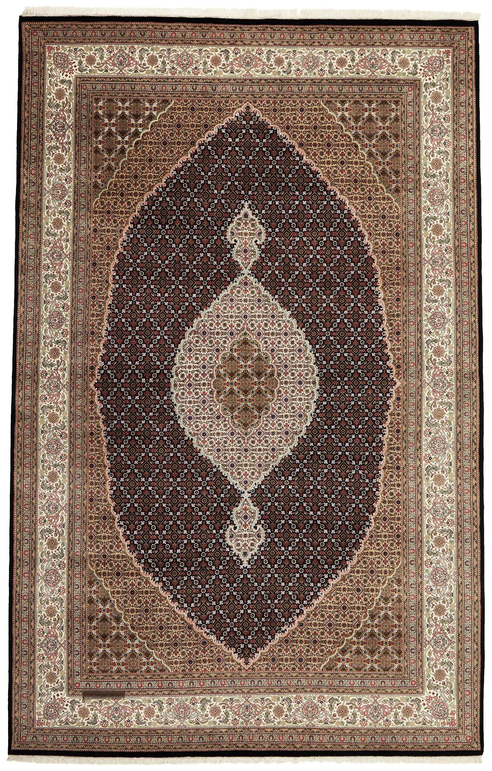 Authentic Oriental rug with traditional geometric and floral design in red, blue, green, beige, brown and black