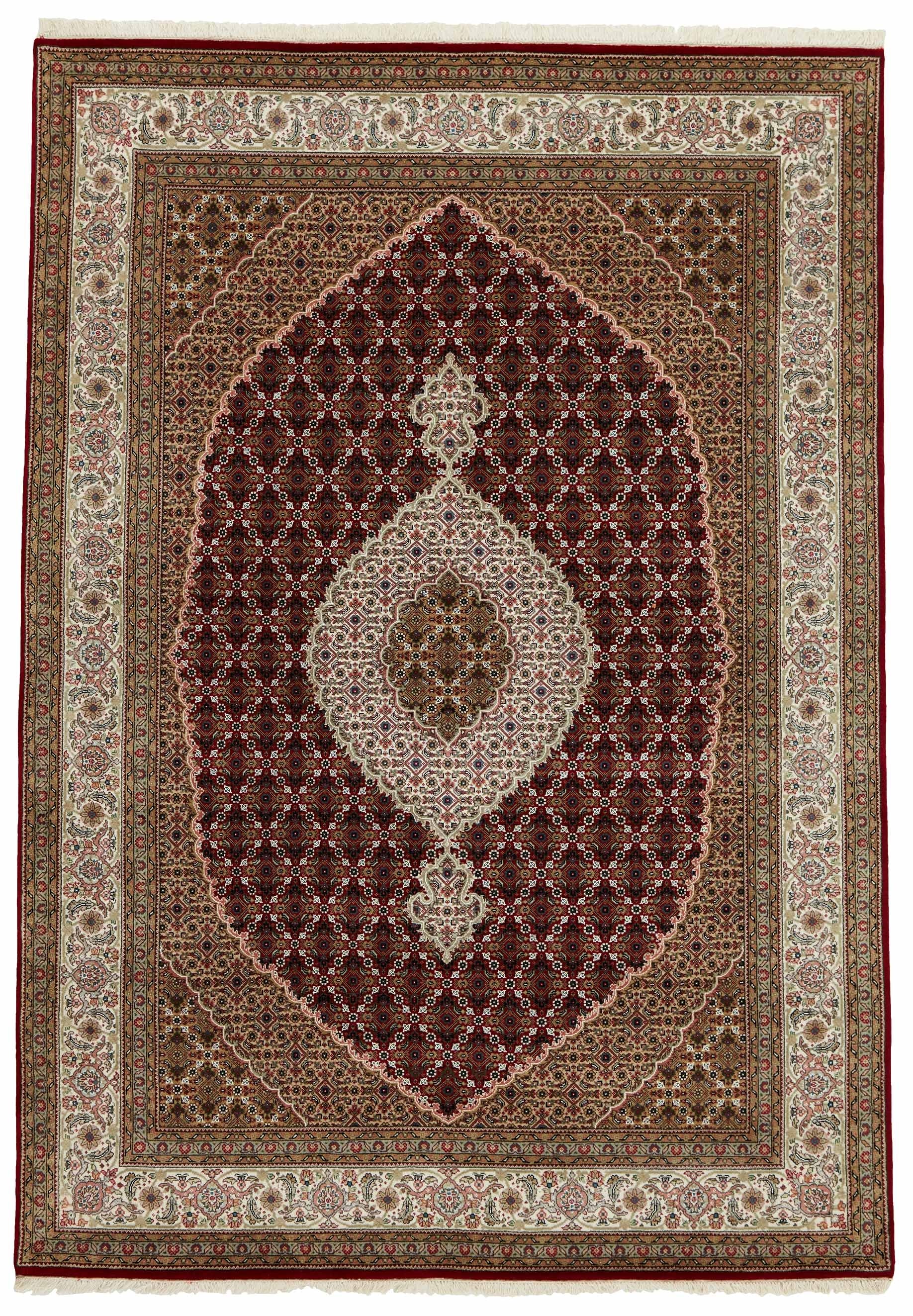 Authentic Oriental rug with traditional geometric and floral design in red, blue, green, beige, brown and black