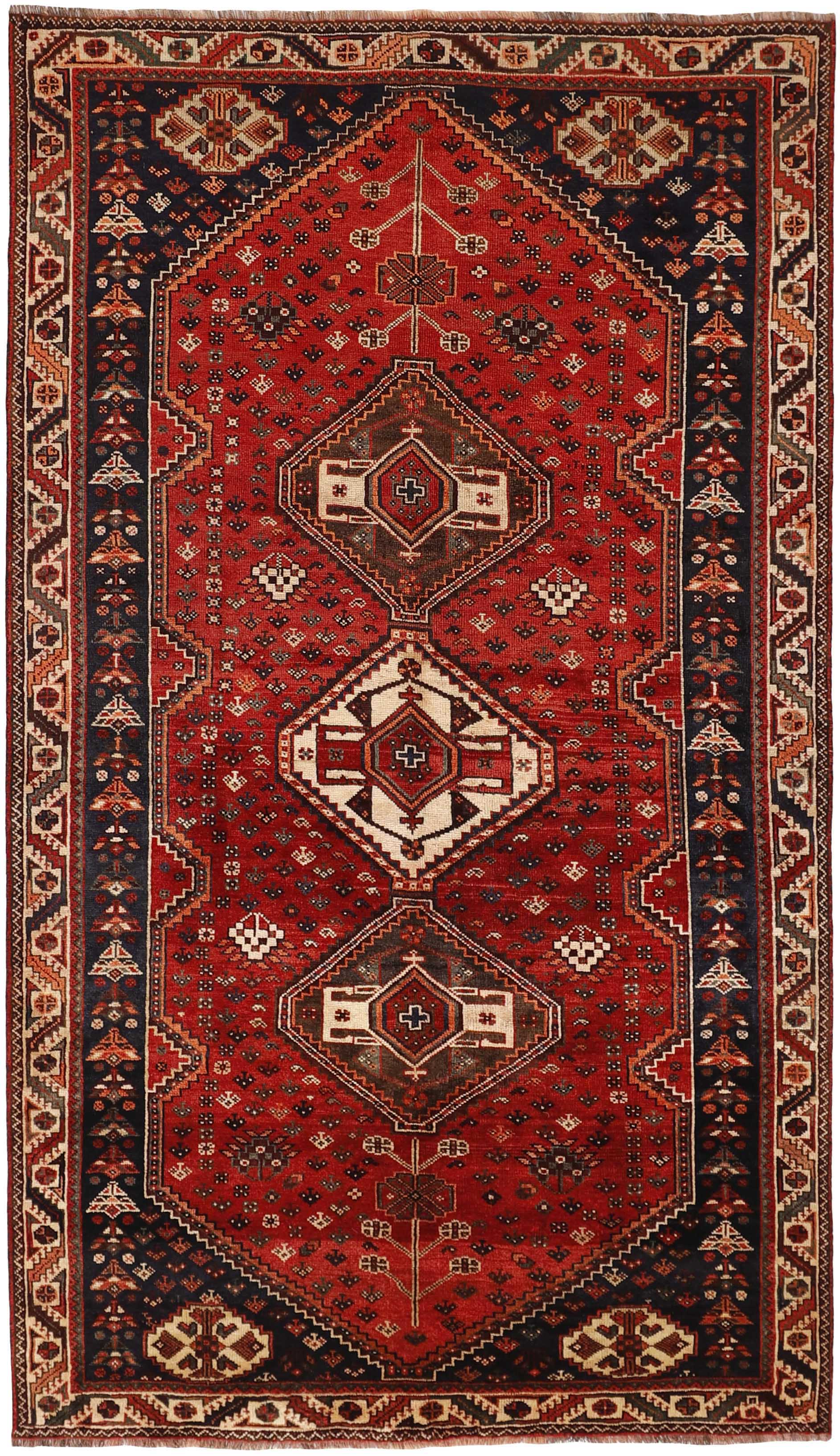 Authentic persian rug with a traditional tribal geometric pattern in red, black and beige