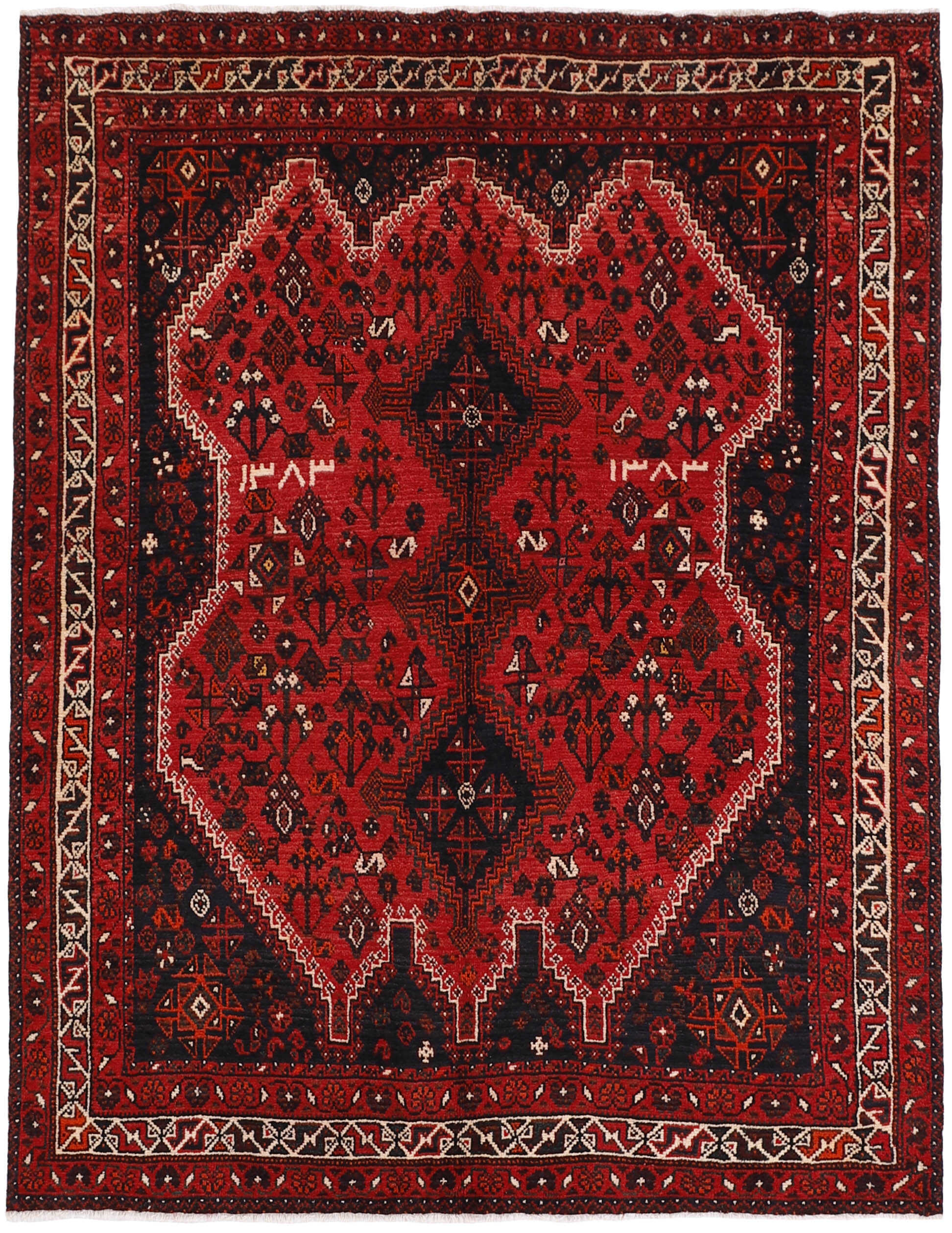 Authentic persian rug with a traditional tribal geometric pattern in red, black and beige