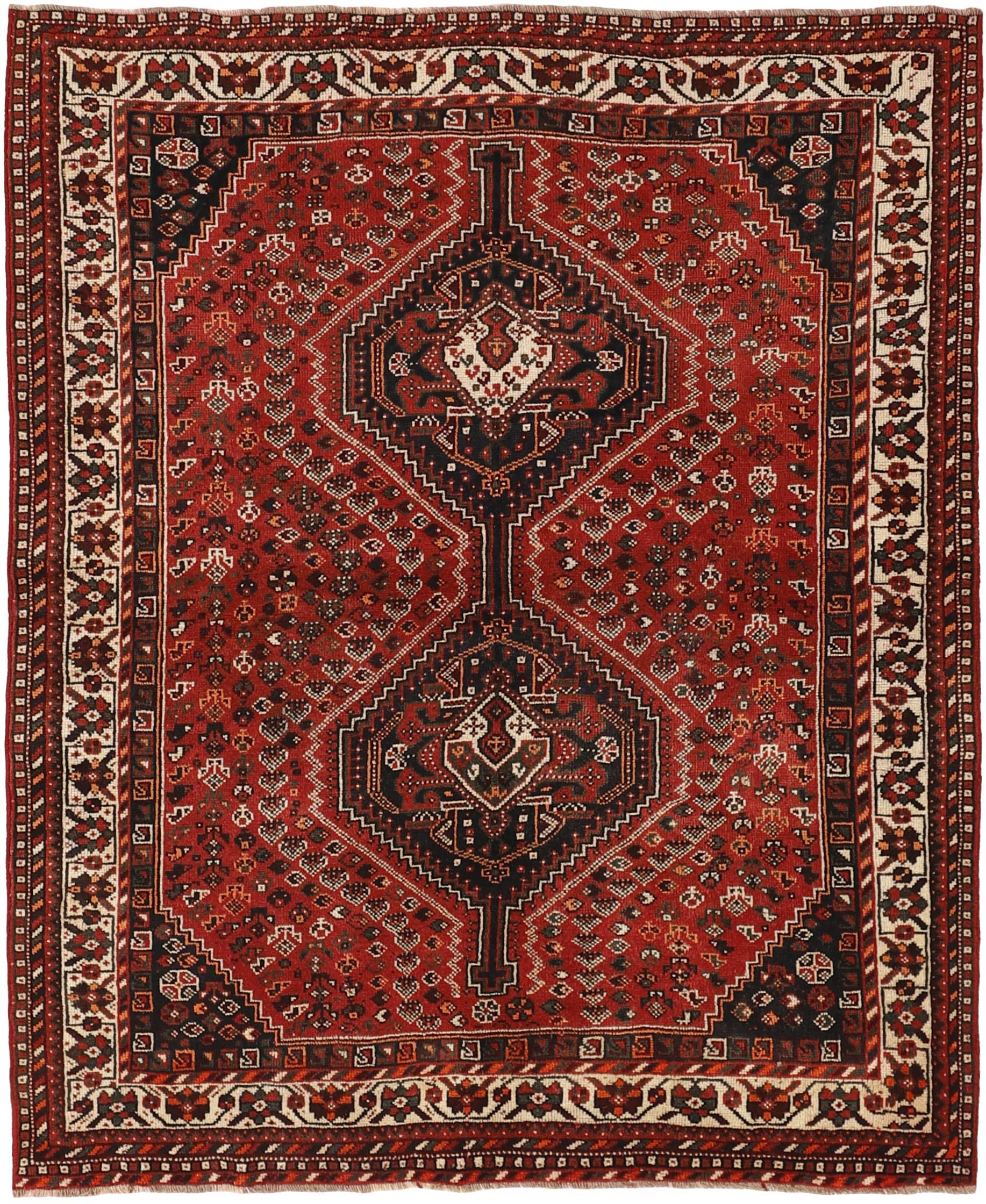 Authentic persian rug with a traditional tribal geometric pattern in red, black and beige
