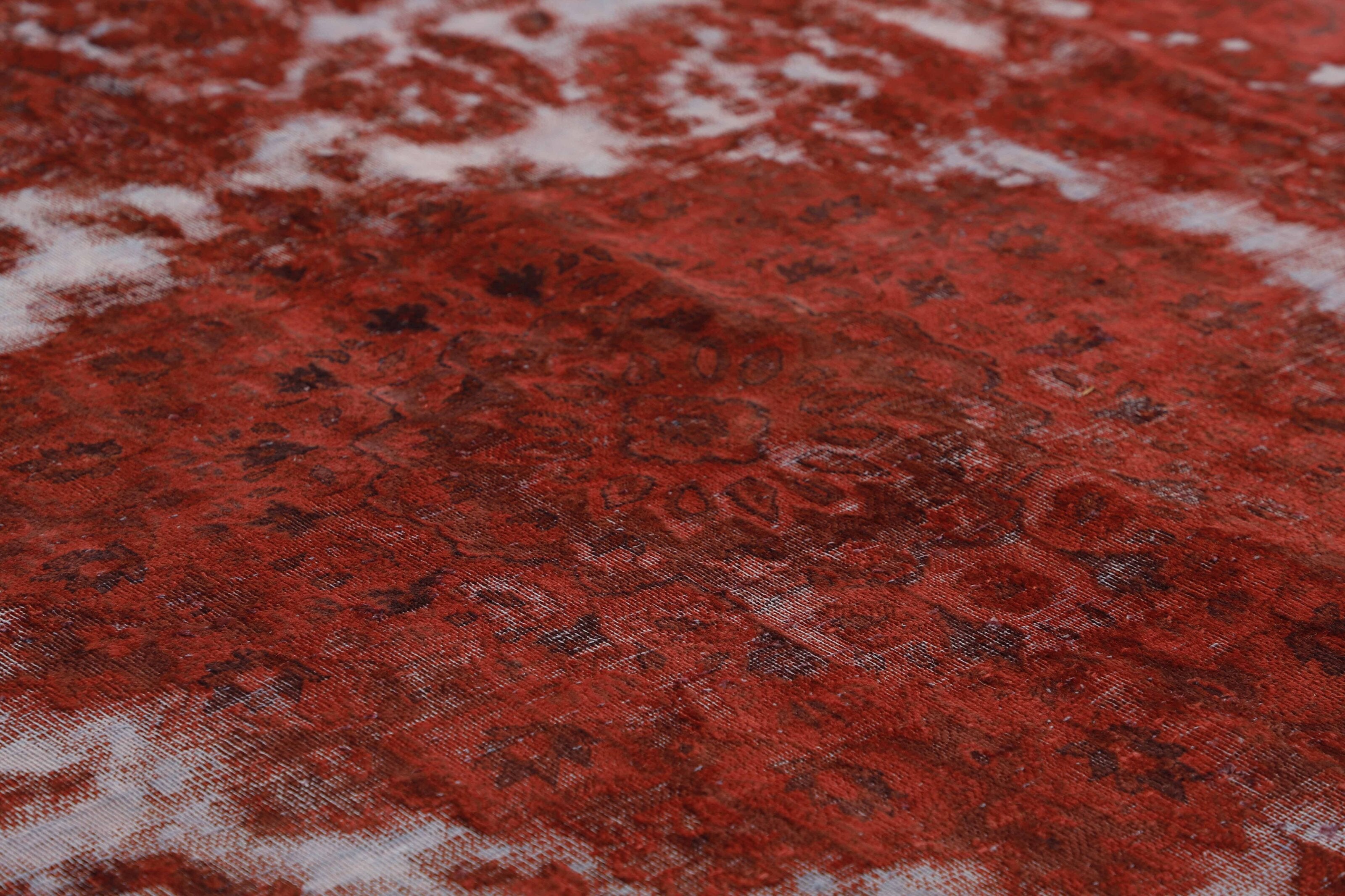 Red distressed bordered vintage Persian-style rug