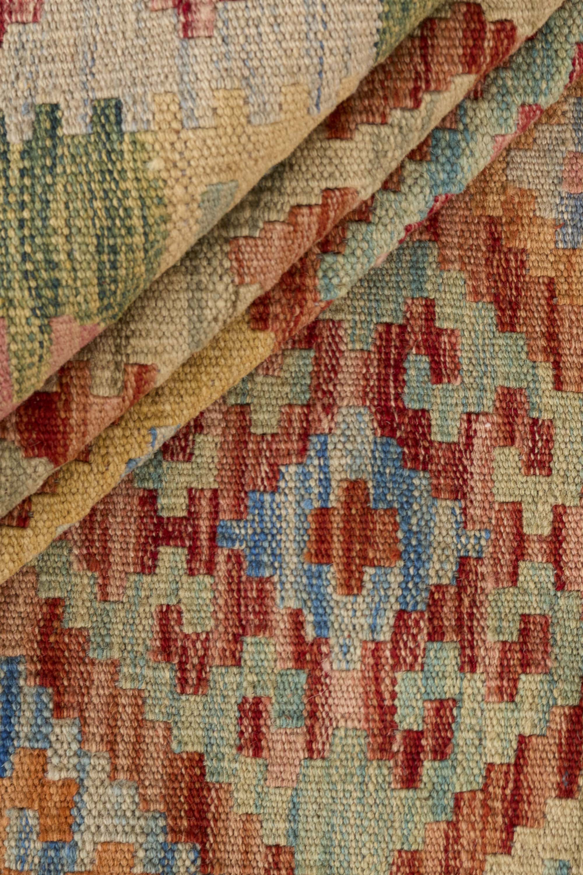 Authentic Persian Kilim flatweave rug with traditional multicolour pattern