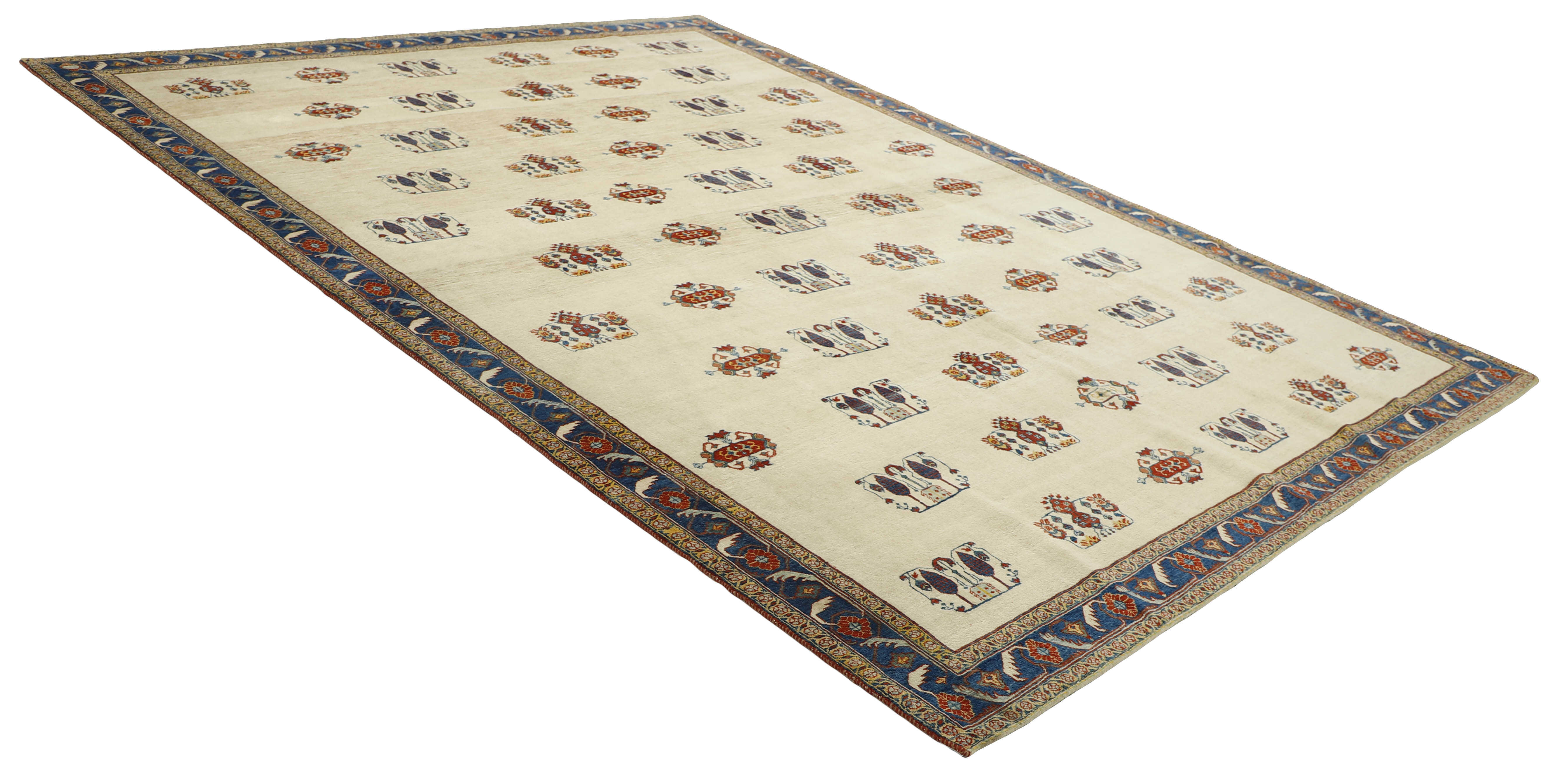 beige Persian rug with tribal geometric design