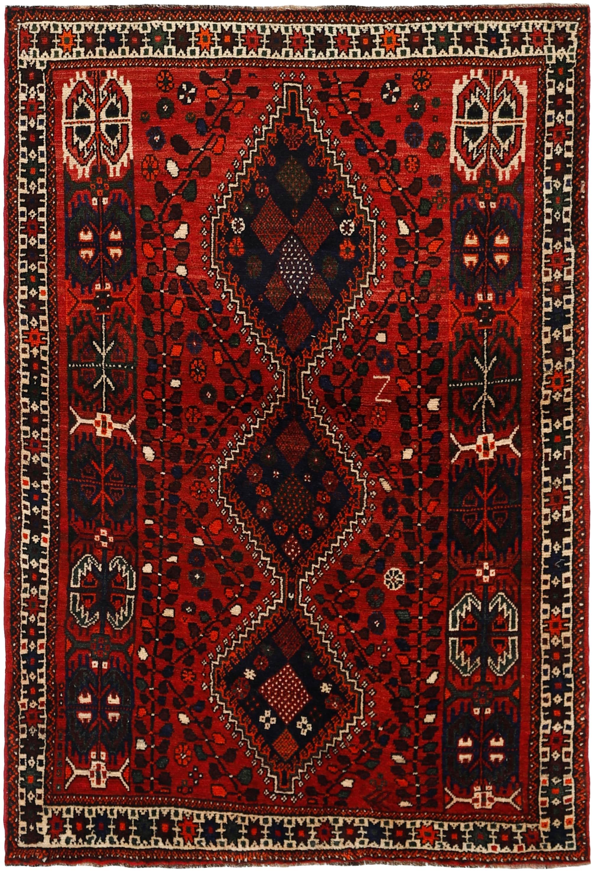 Authentic persian rug with a traditional tribal geometric pattern in red