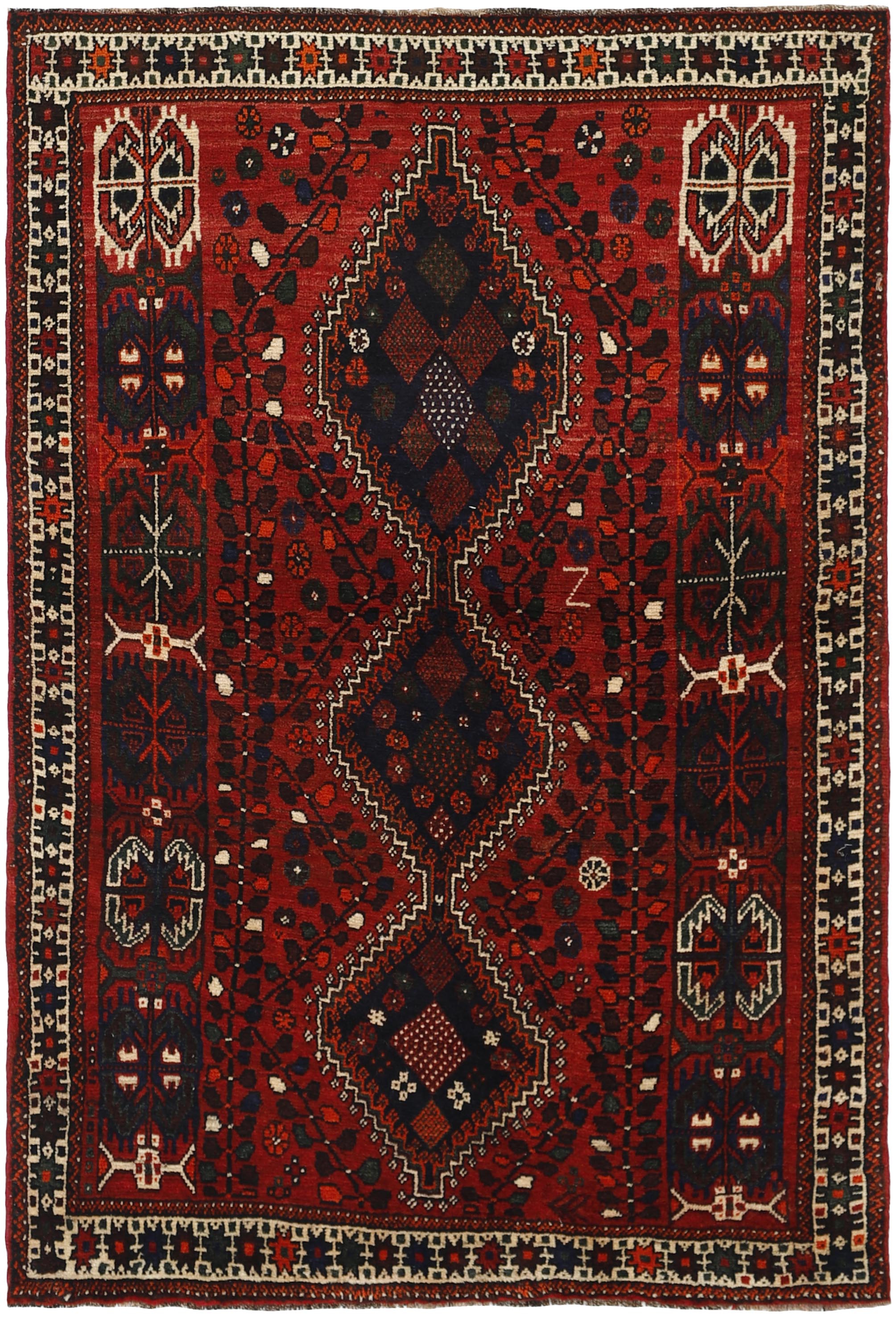 Authentic persian rug with a traditional tribal geometric pattern in red, black and beige