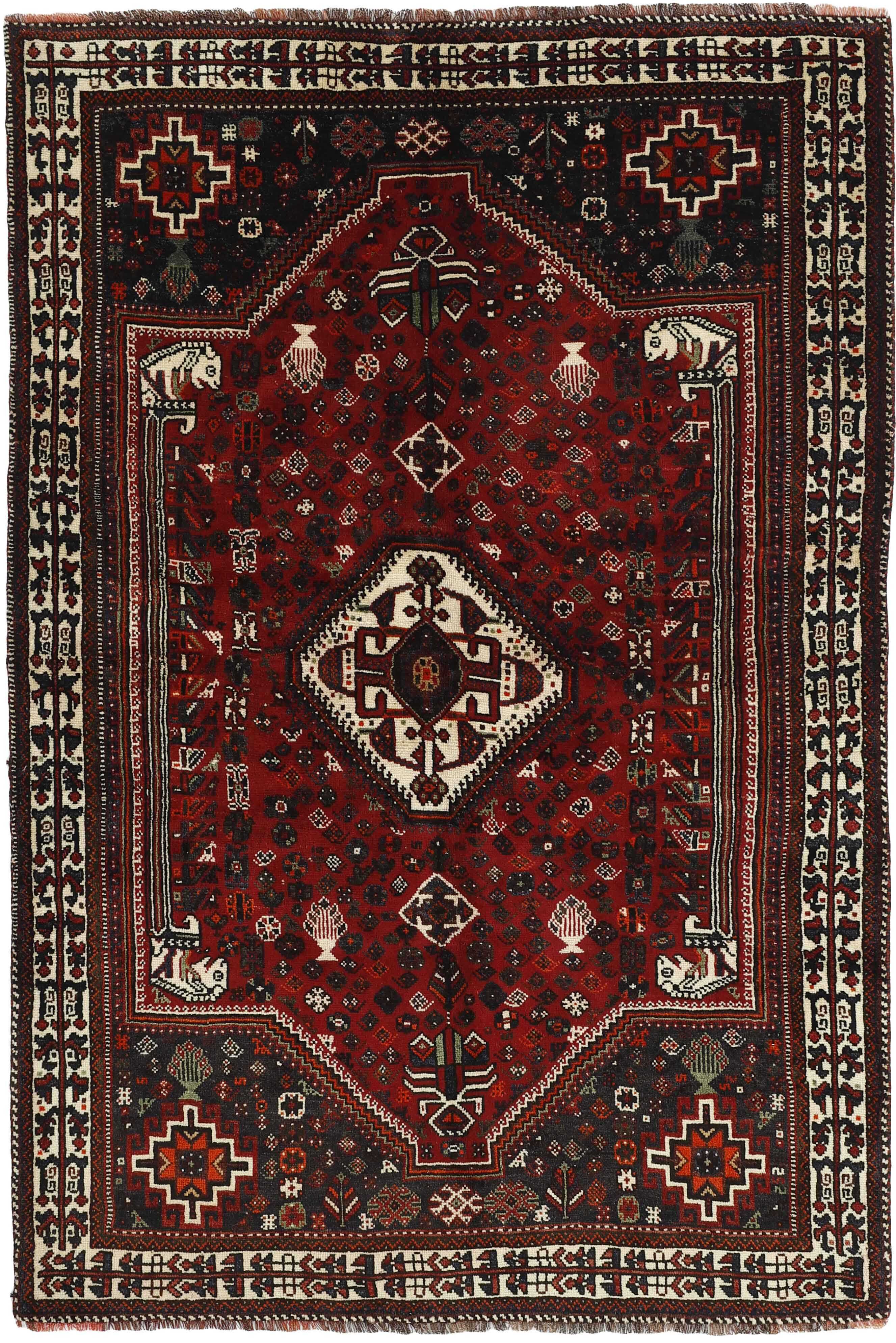 Authentic persian rug with a traditional tribal geometric pattern in red, black and beige