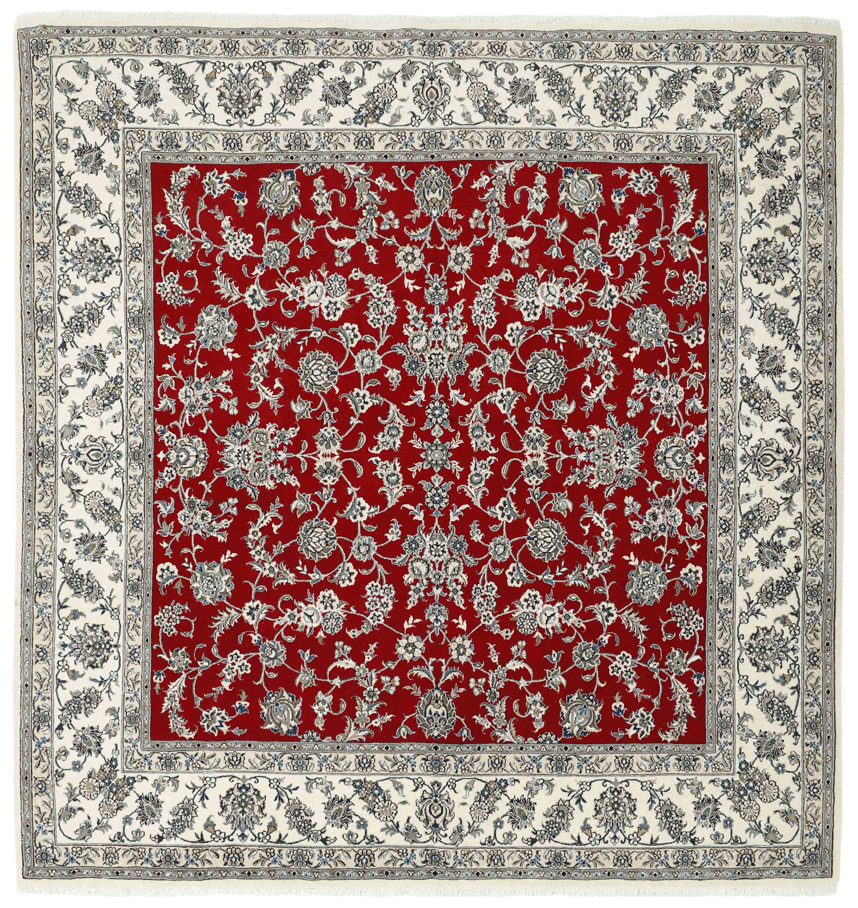 Authentic persian rug with a traditional floral design in cream and red