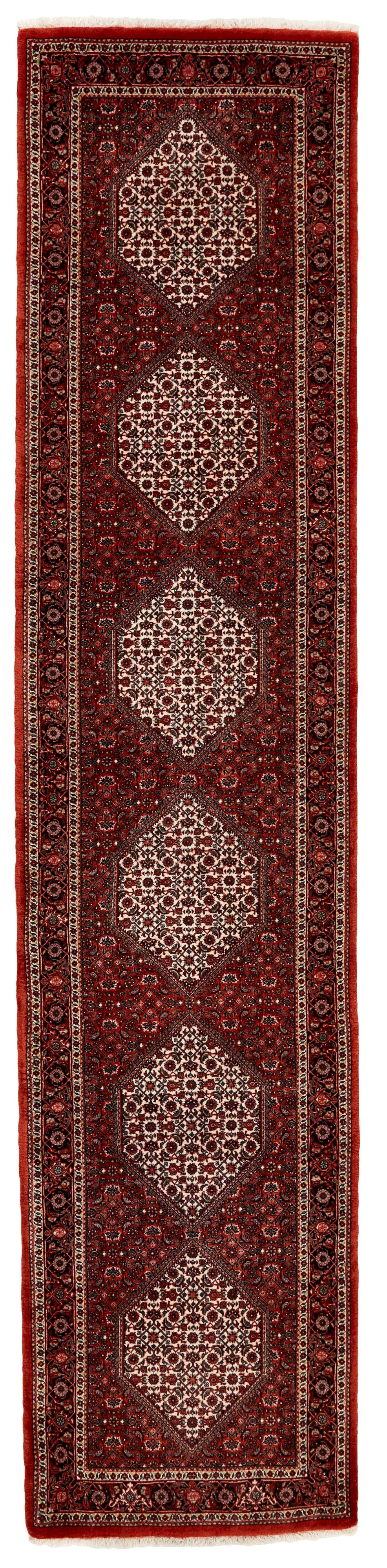 red and cream persian runner with traditional floral design