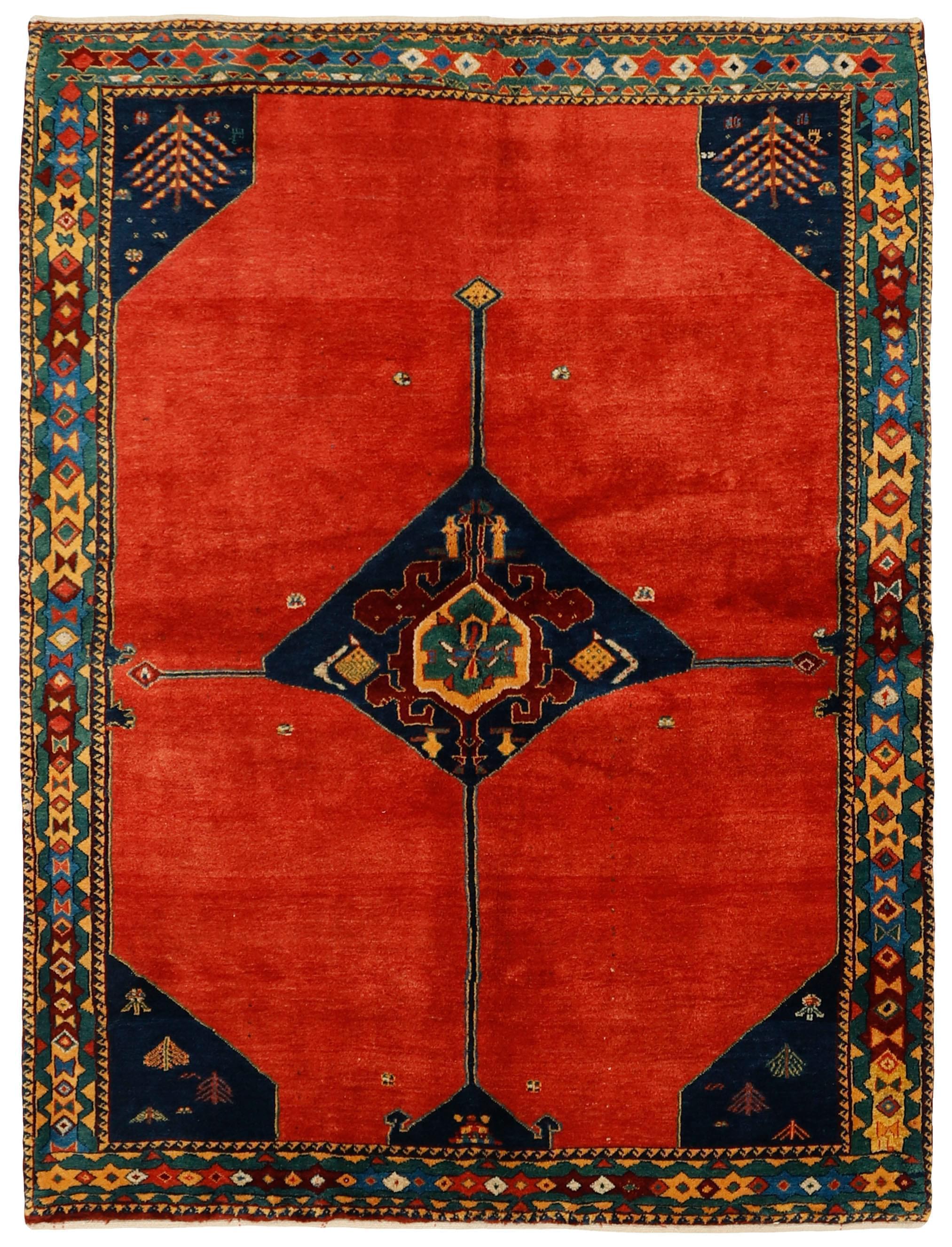 red Persian rug with tribal geometric design