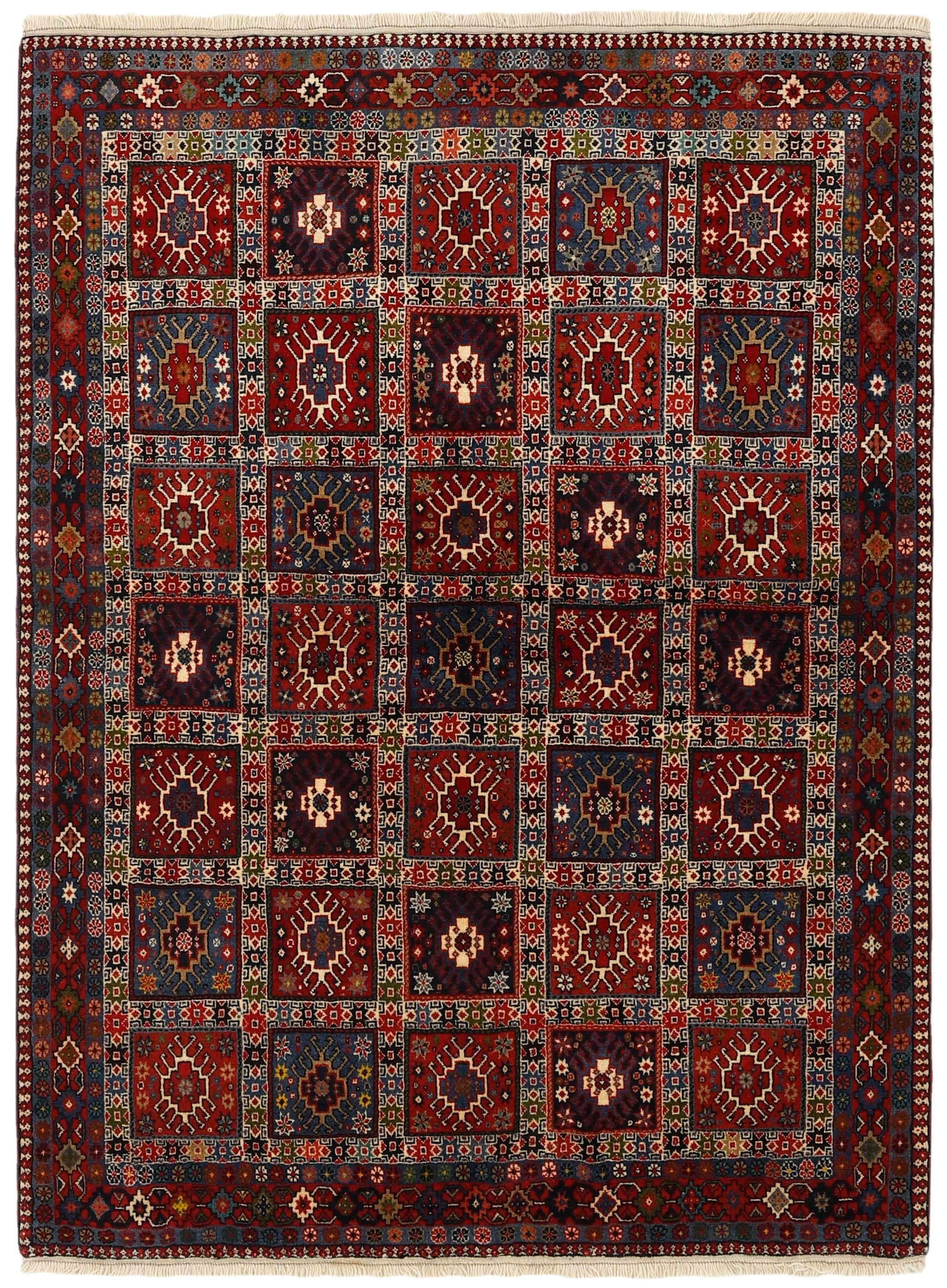 red authentic persian rug with a traditional design