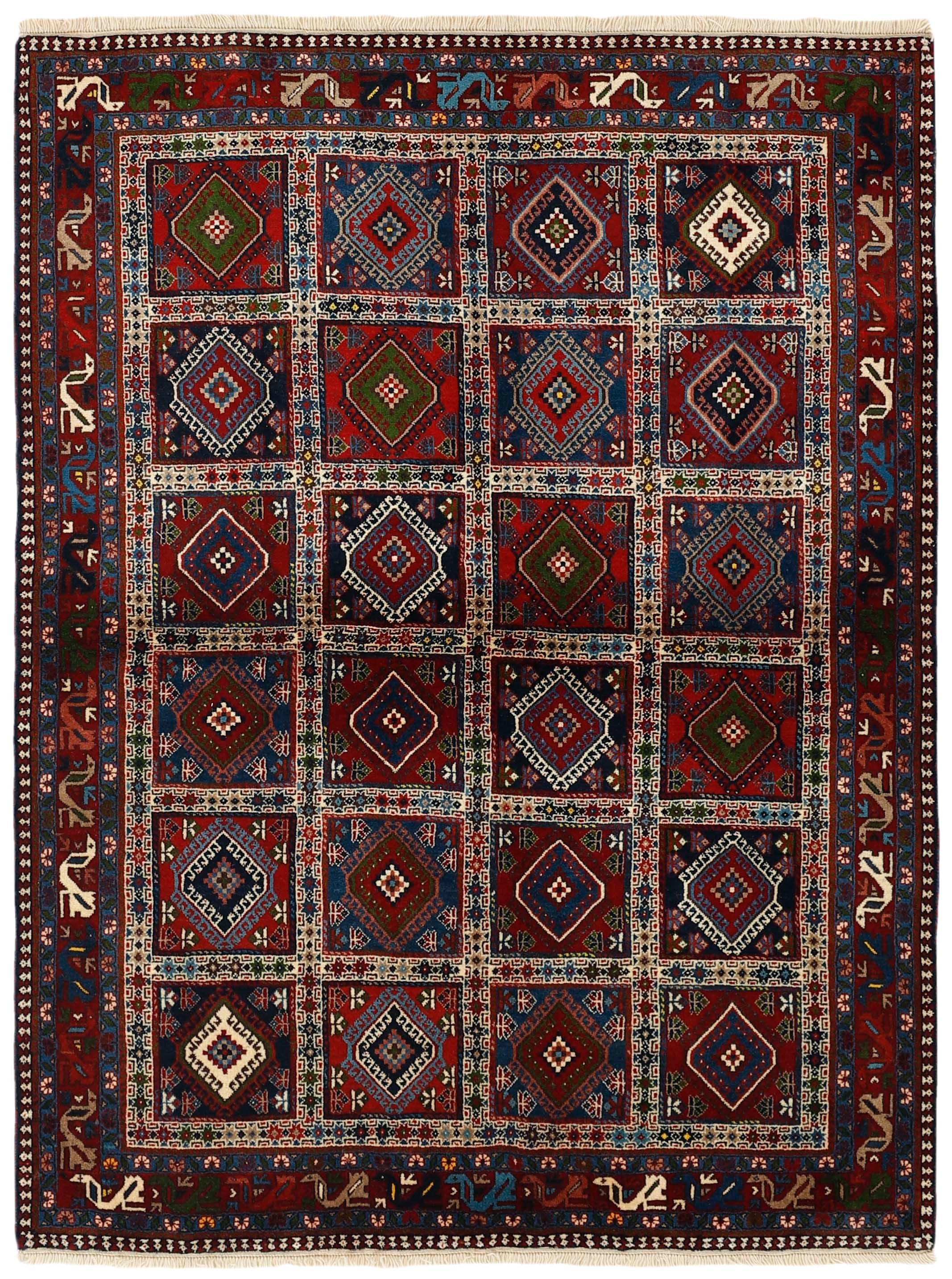 red authentic persian rug with a traditional design