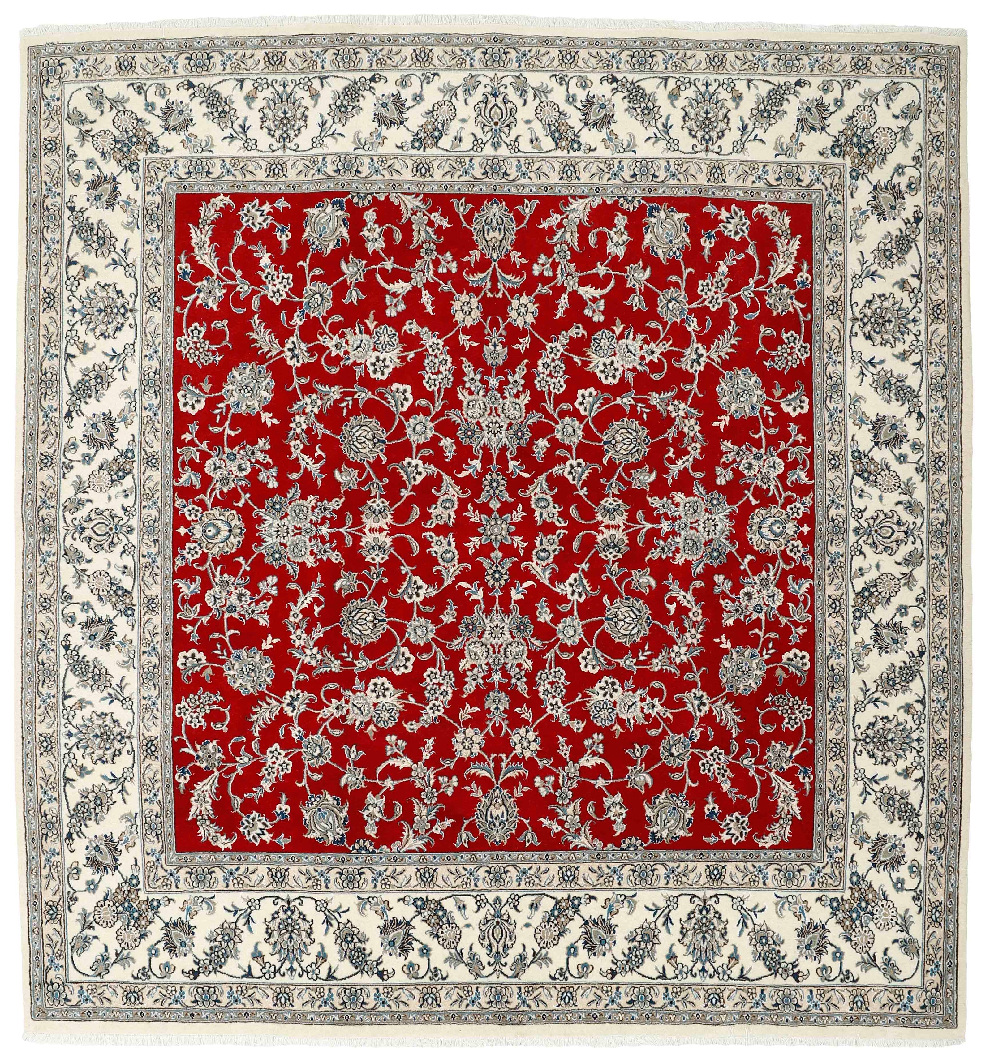 Authentic persian rug with a traditional floral design in red and beige