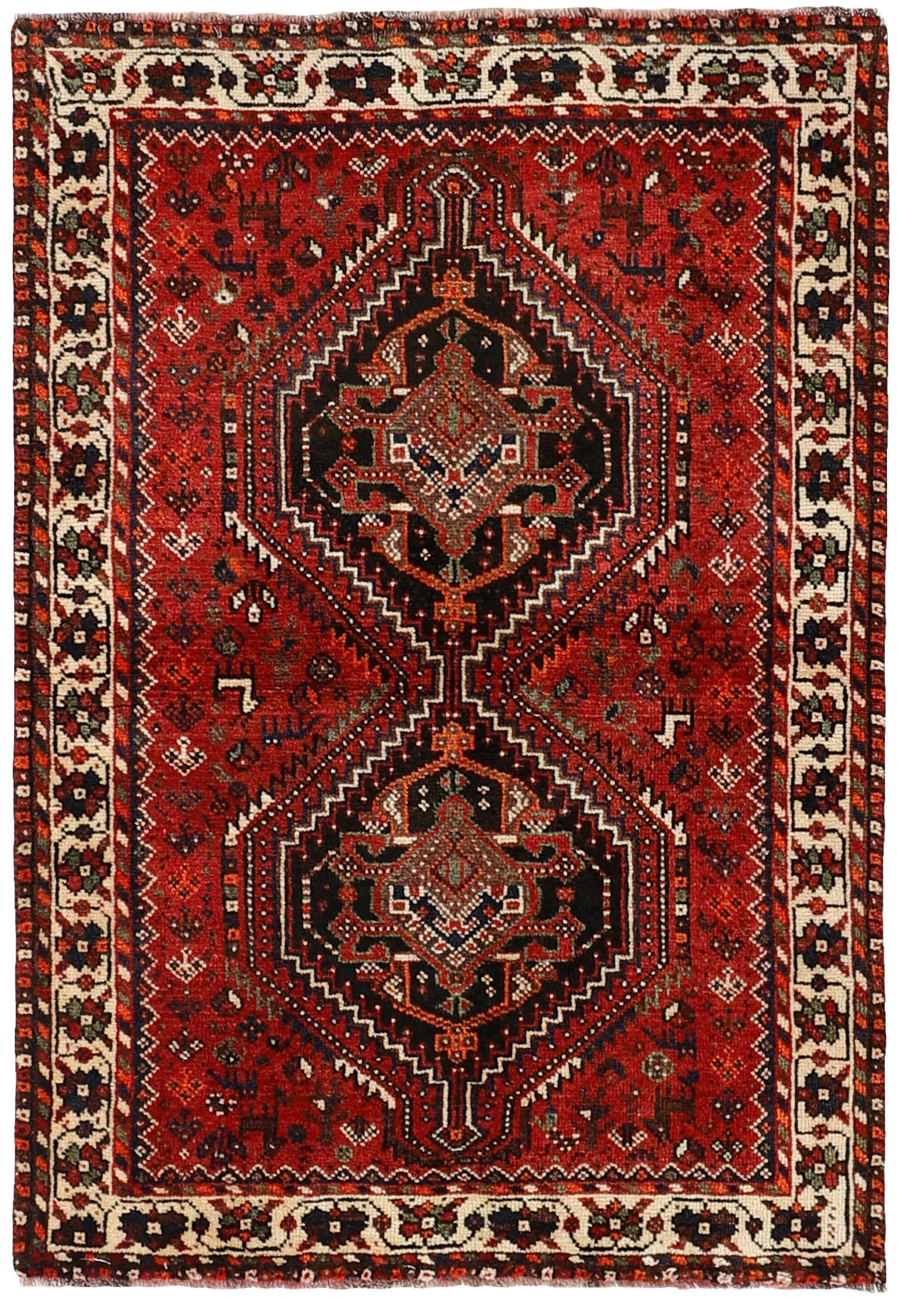 Authentic persian rug with a traditional tribal geometric pattern in red