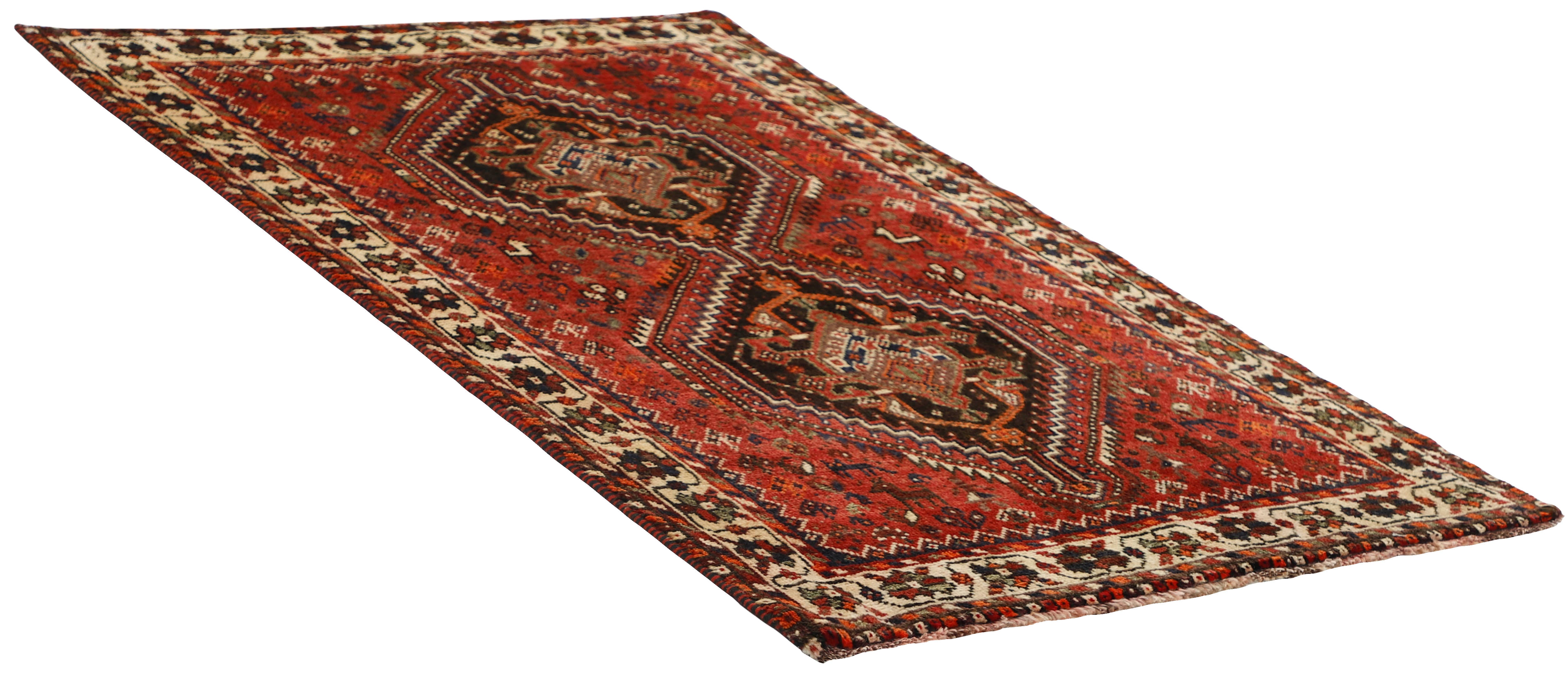 Authentic persian rug with a traditional tribal geometric pattern in red