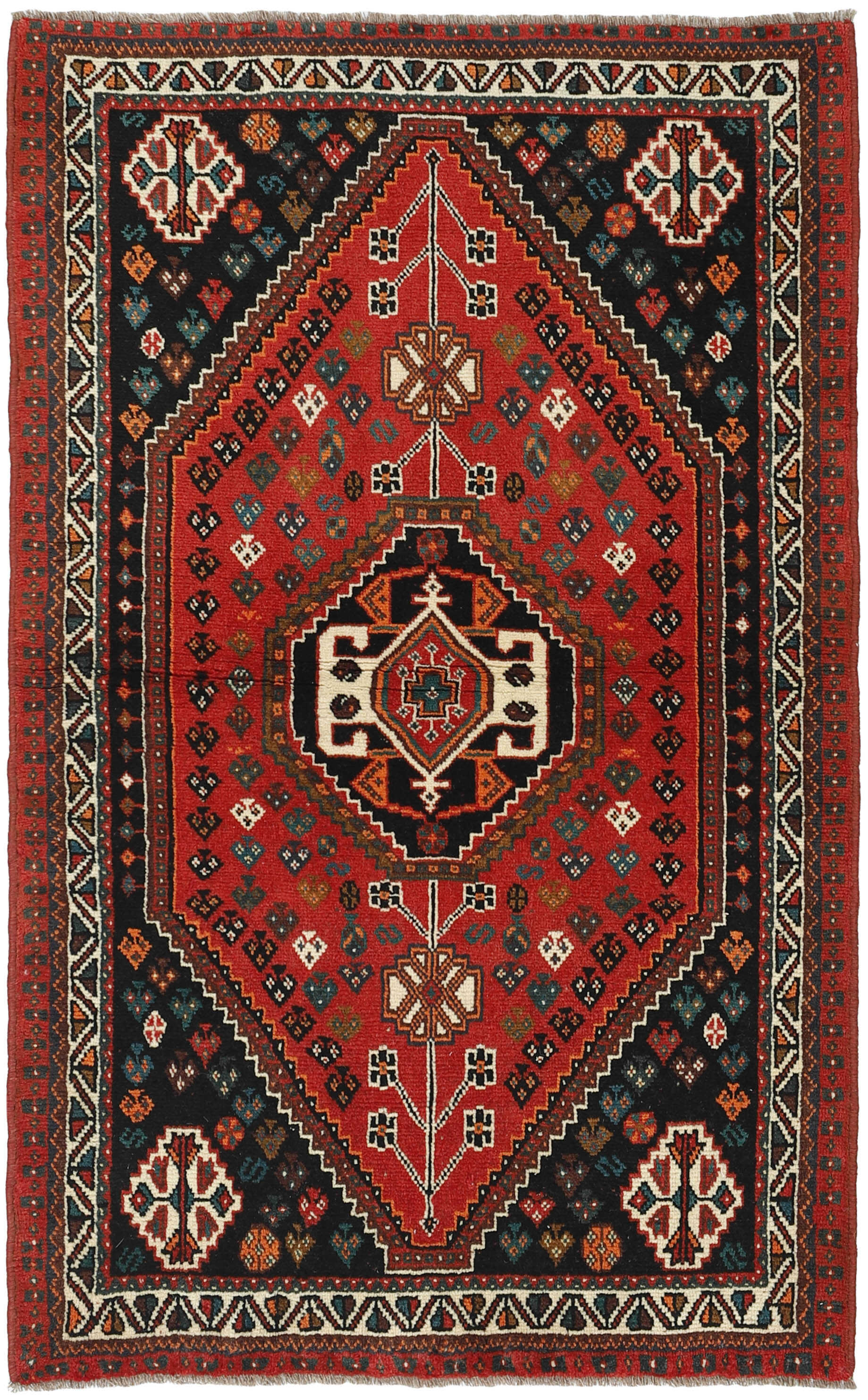 Authentic persian rug with a traditional tribal geometric pattern in red