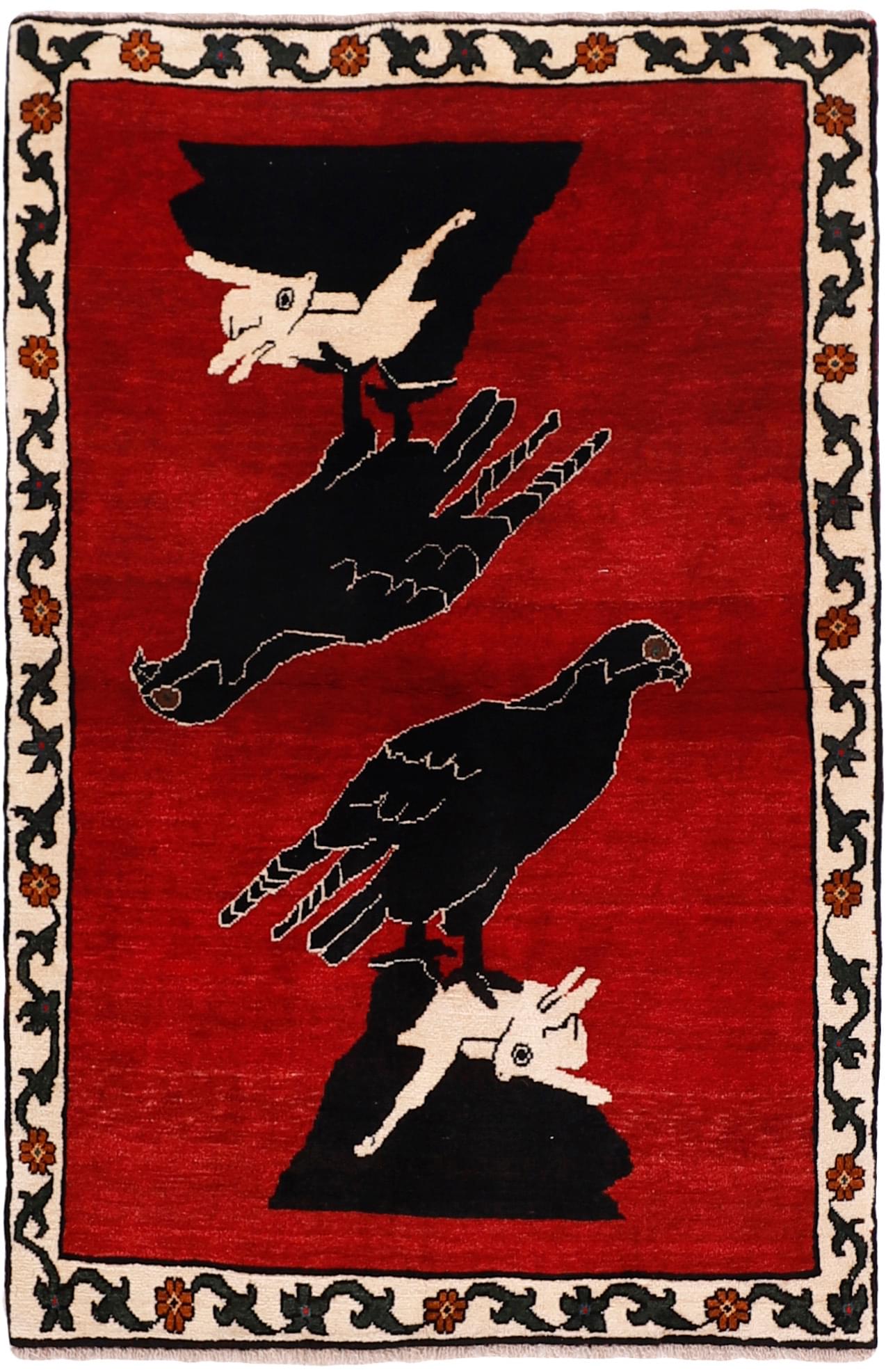 red persian rug with figural design