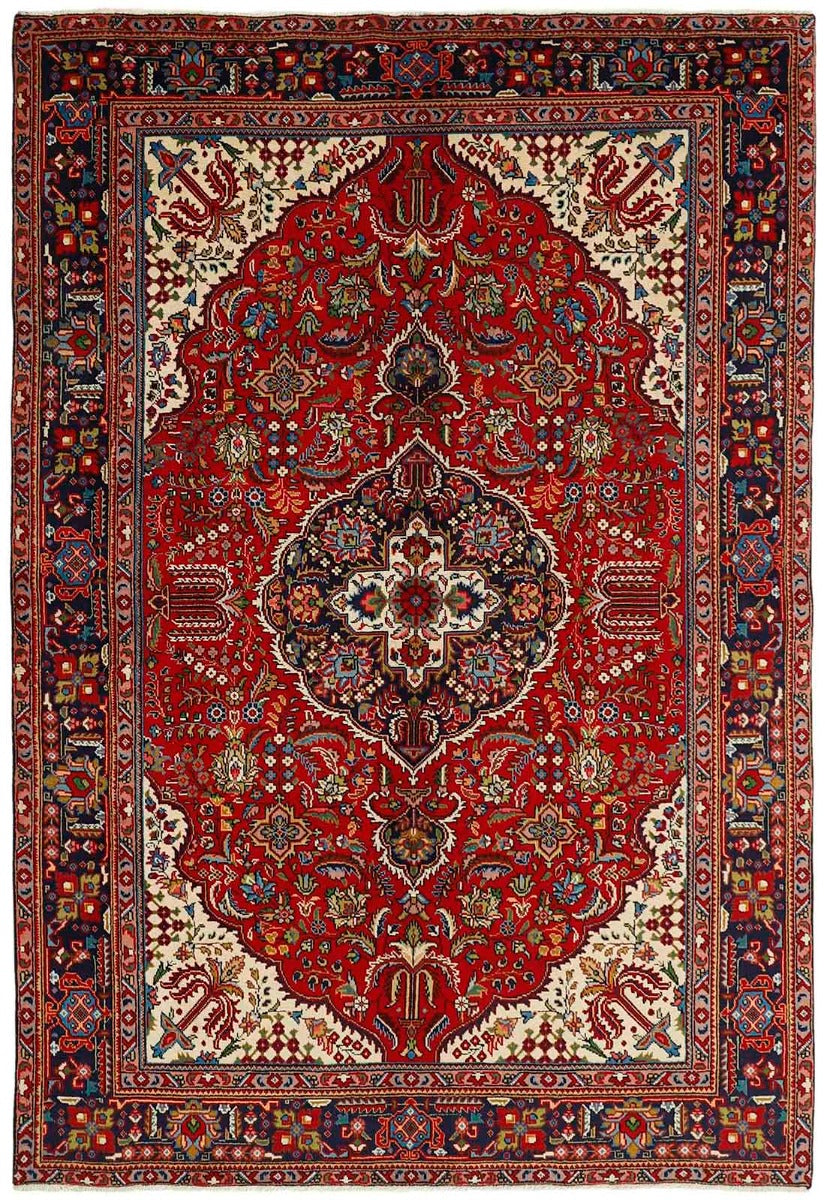 authentic persian rug with traditional floral design in red, black, beige and green