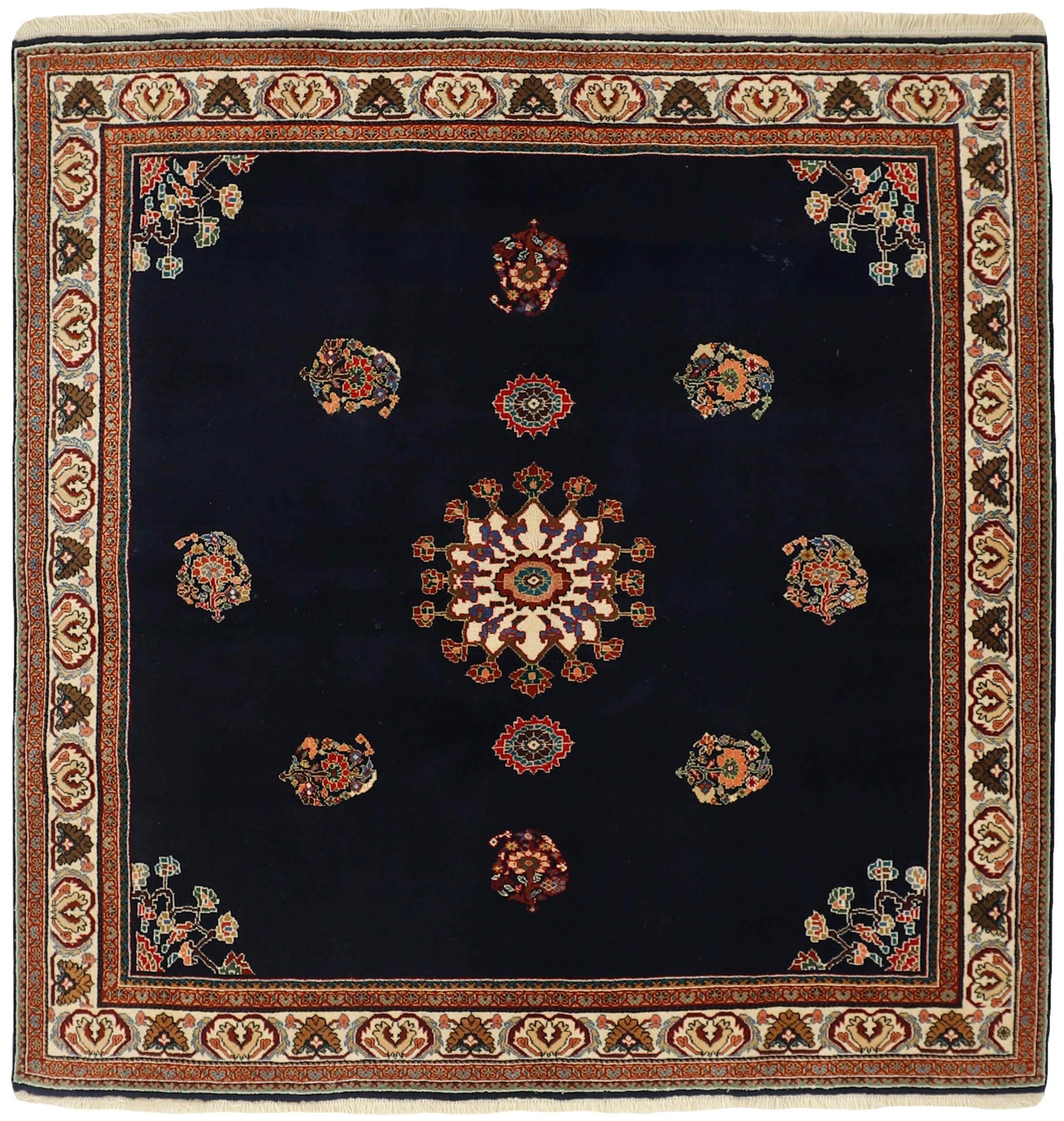 Black Persian rug with tribal geometric design