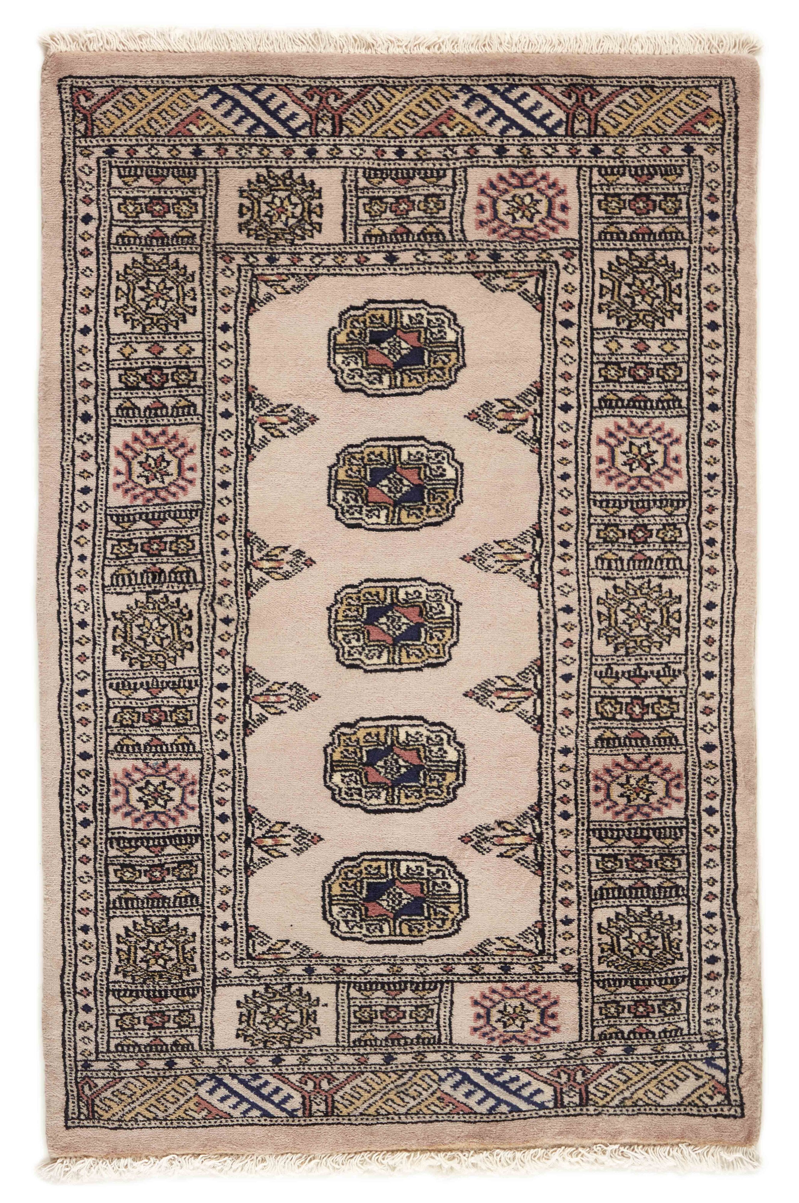 Beige Oriental rug with traditional bordered pattern