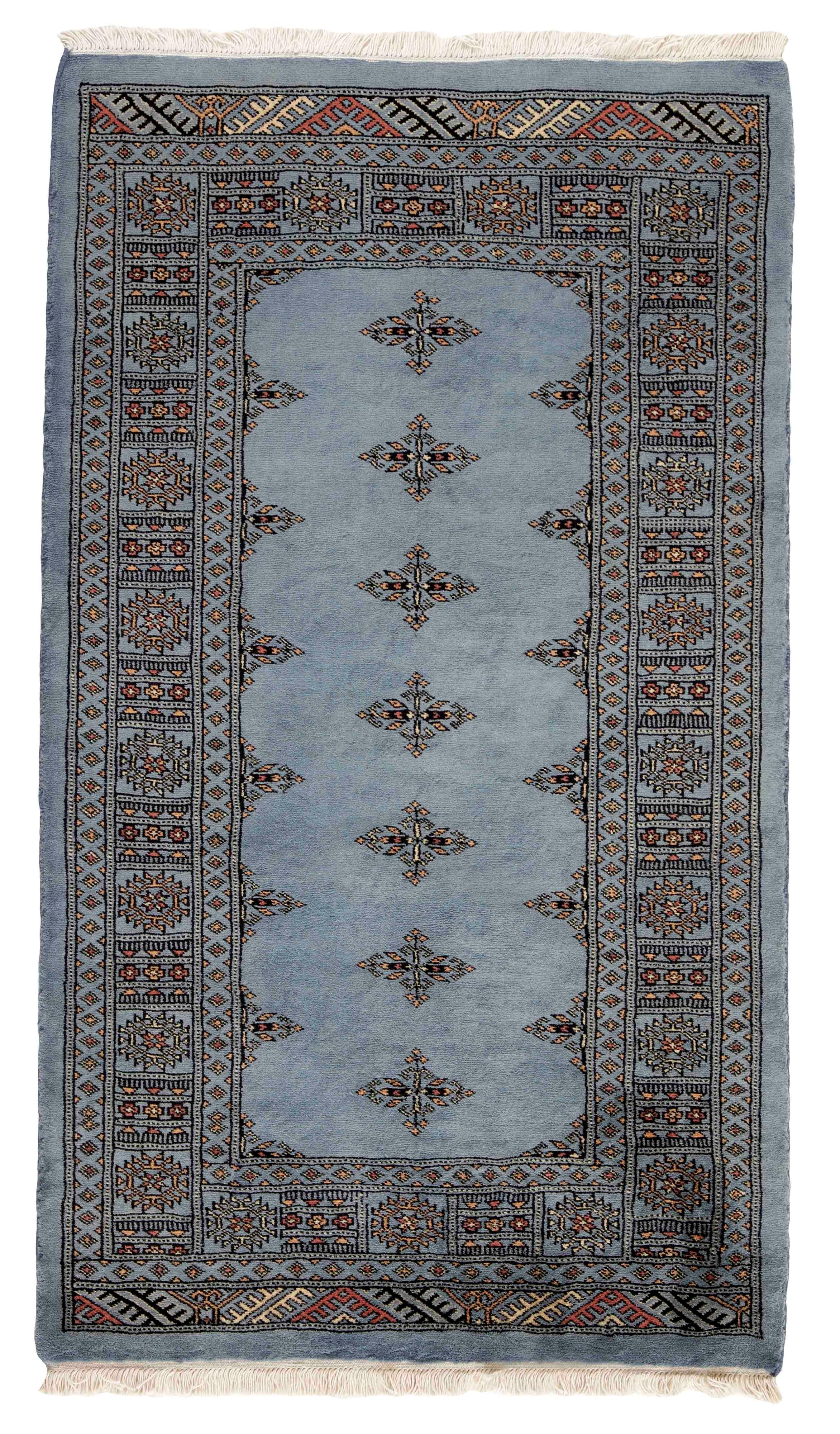 blue oriental rug with traditional pattern