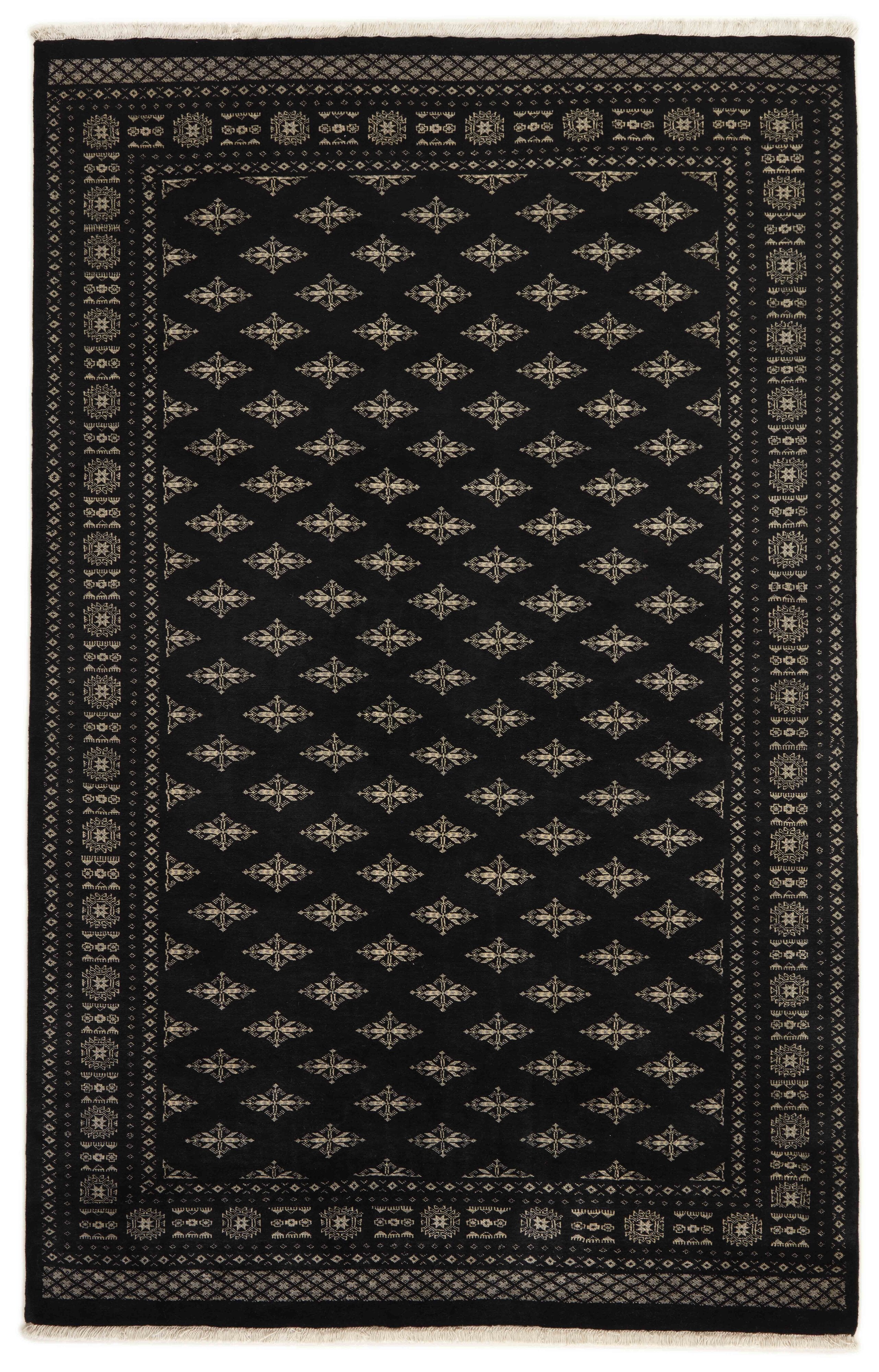 Black Oriental rug with traditional bordered pattern