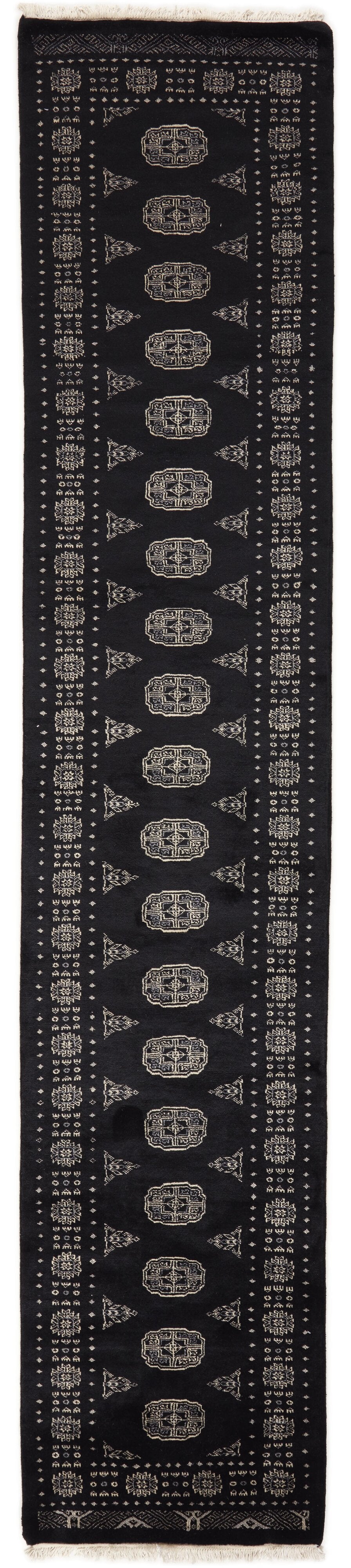 Black Oriental runner with traditional bordered pattern