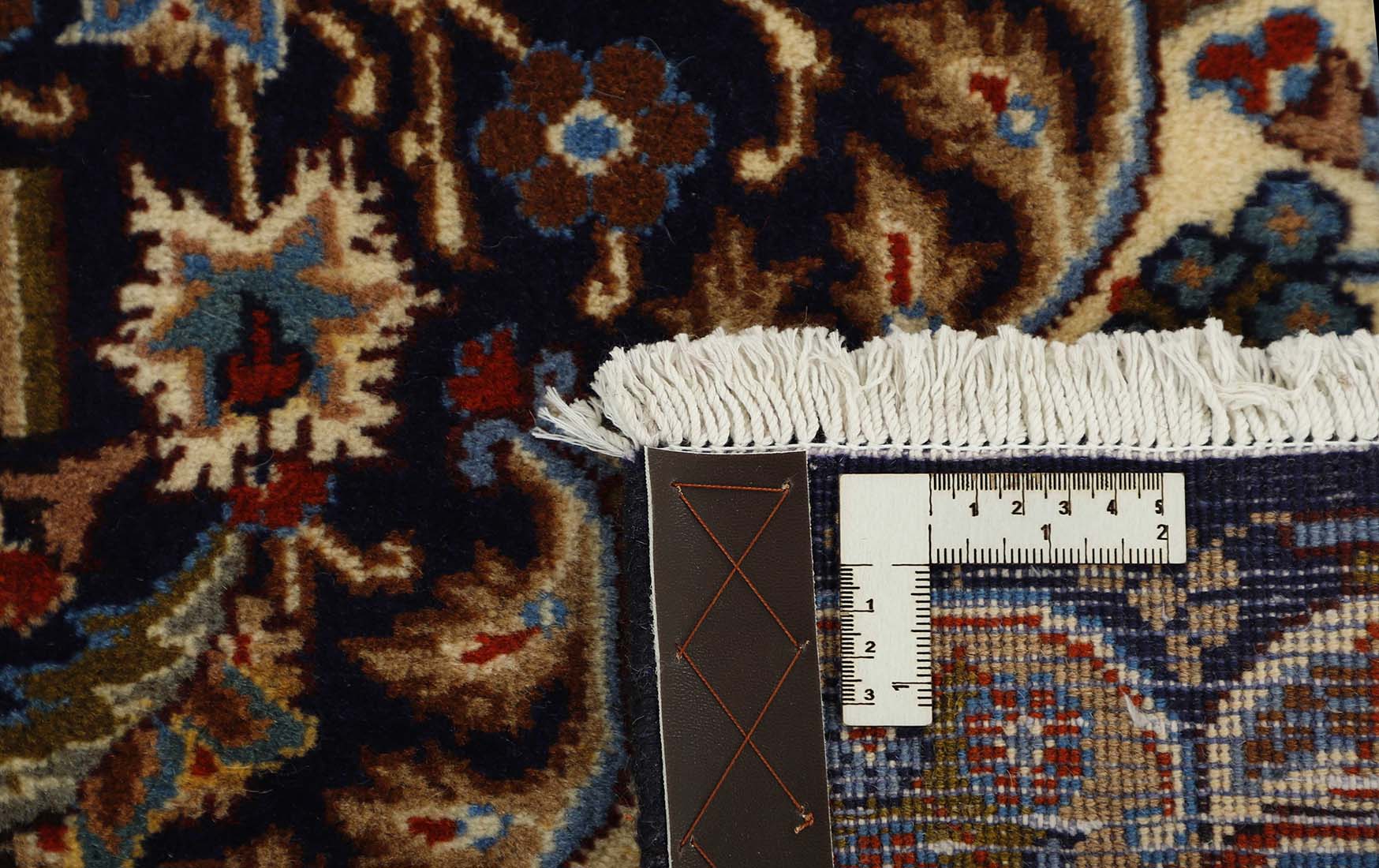 Authentic persian rug with a traditional floral design in red