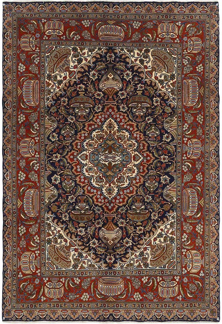 Authentic persian rug with a traditional floral design in red

