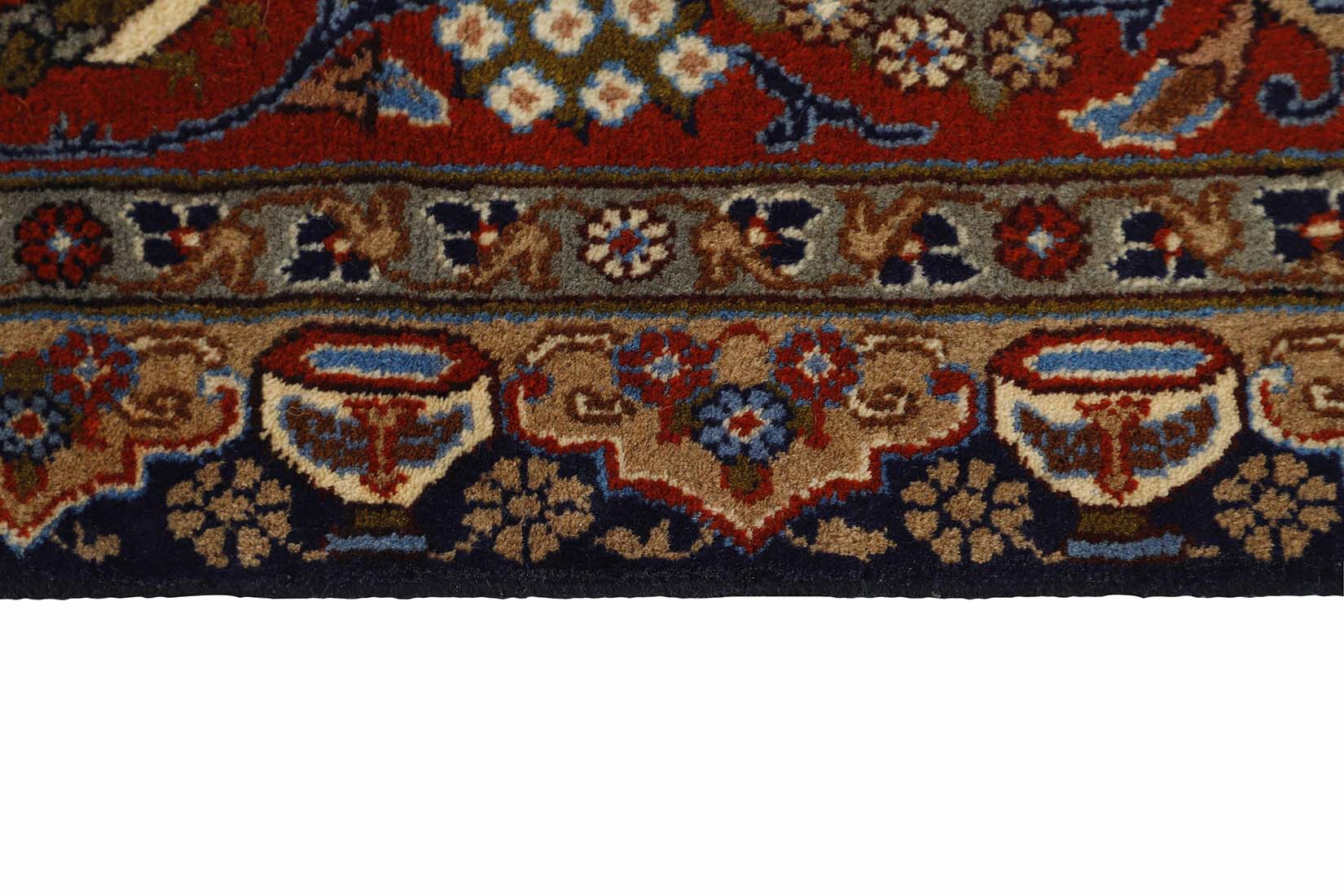 Authentic persian rug with a traditional floral design in red