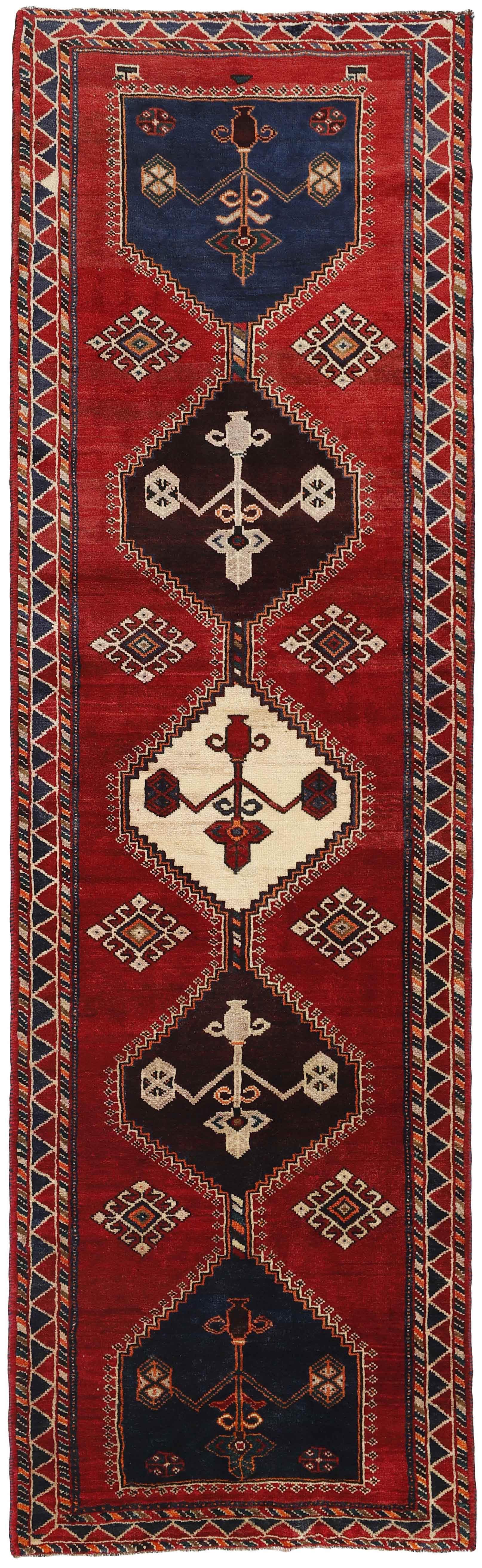 Authentic persian rug with a traditional tribal geometric pattern in red, beige and black