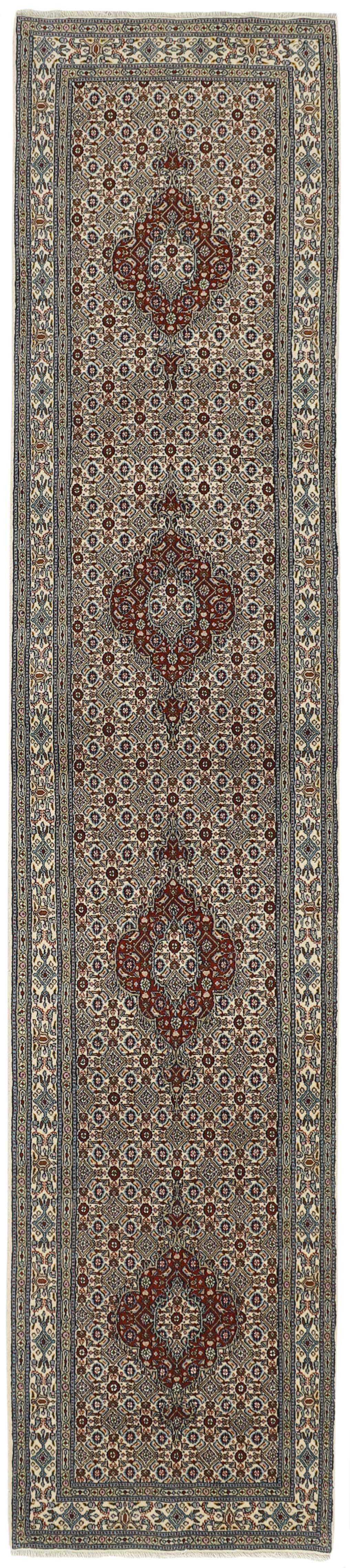 authentic persian runner with traditional floral pattern in cream, blue and red