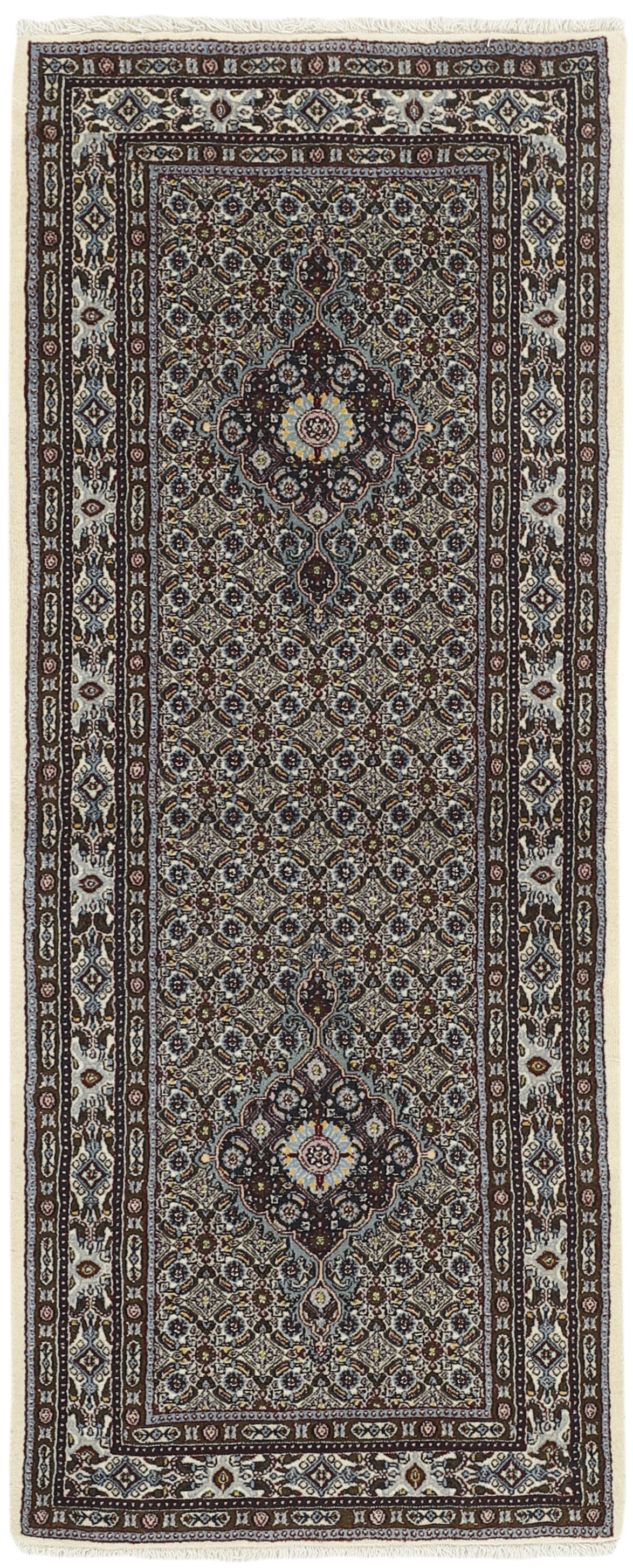authentic persian rug with traditional floral pattern in cream, blue and red
