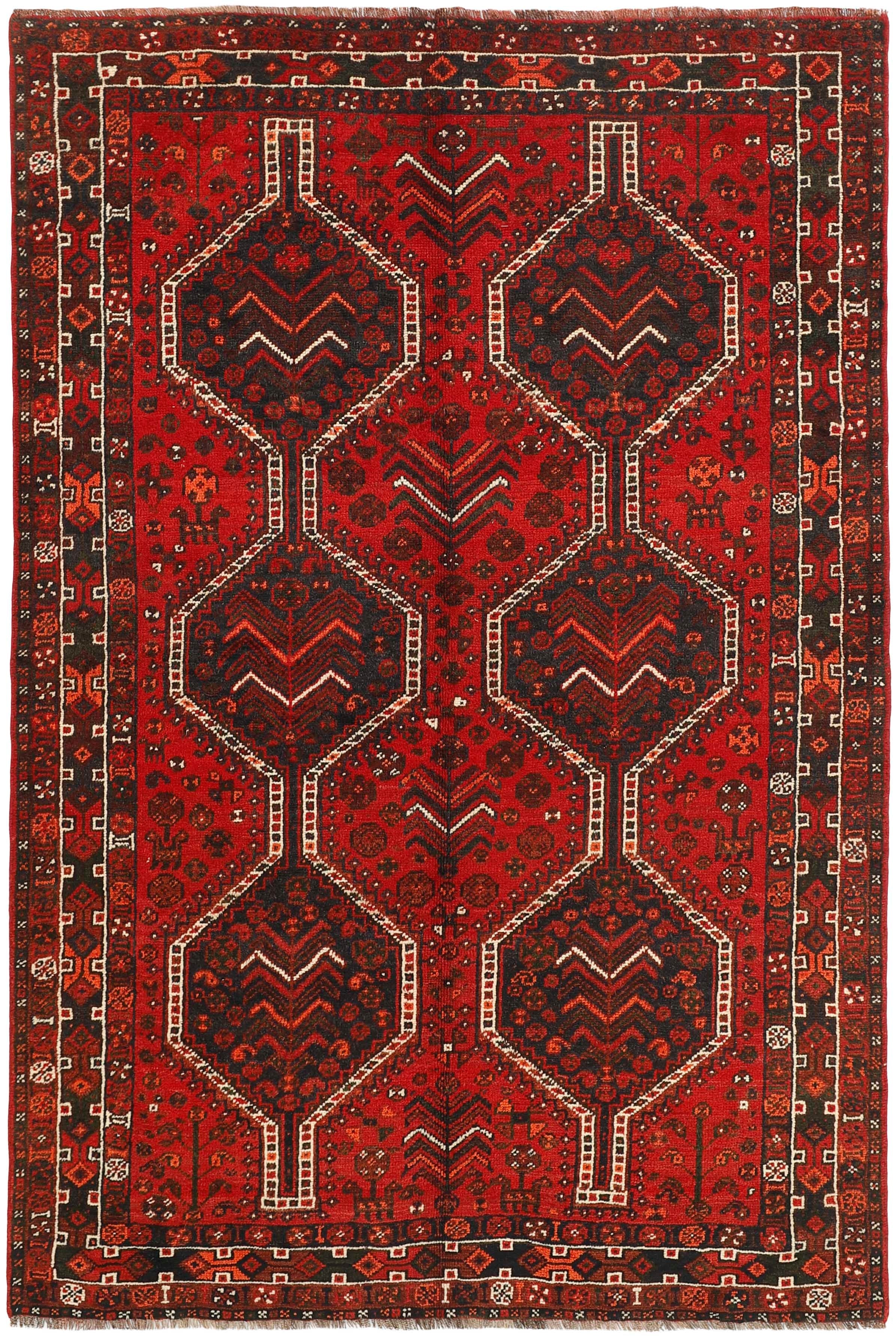 Authentic persian rug with a traditional tribal geometric pattern in red, black and ivory
