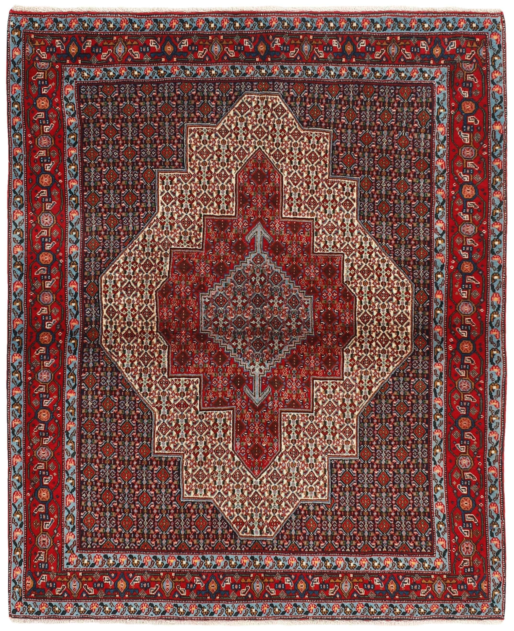 authentic persian rug with a traditional geometric design in red