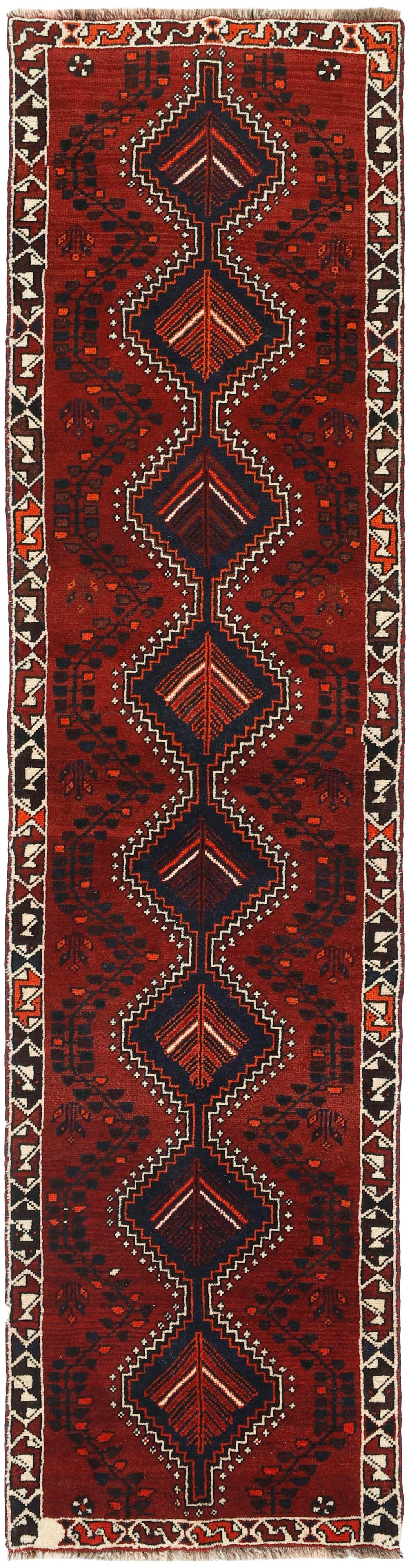 red persian rug with geometric design
