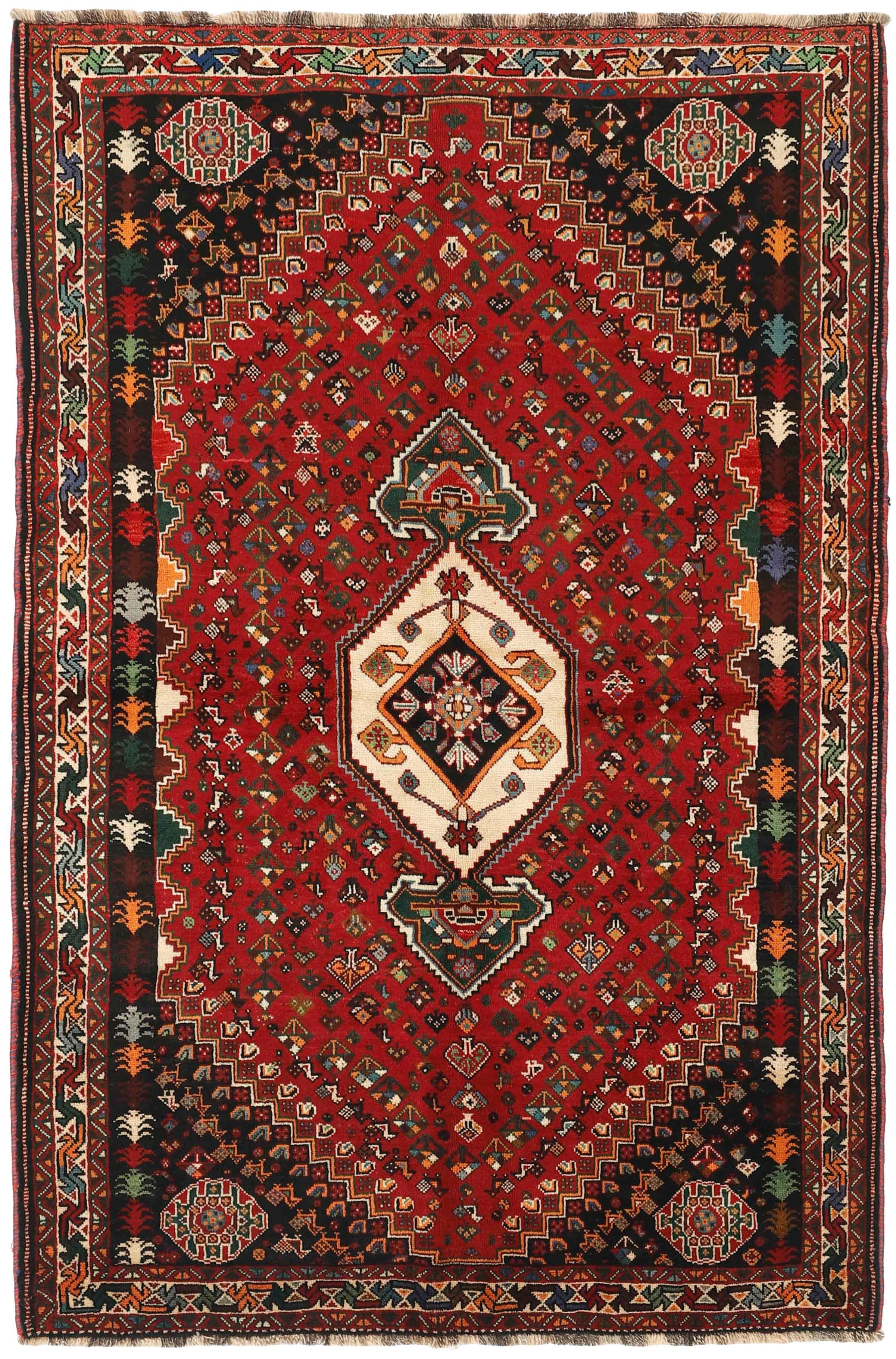red and black persian rug with geometric design