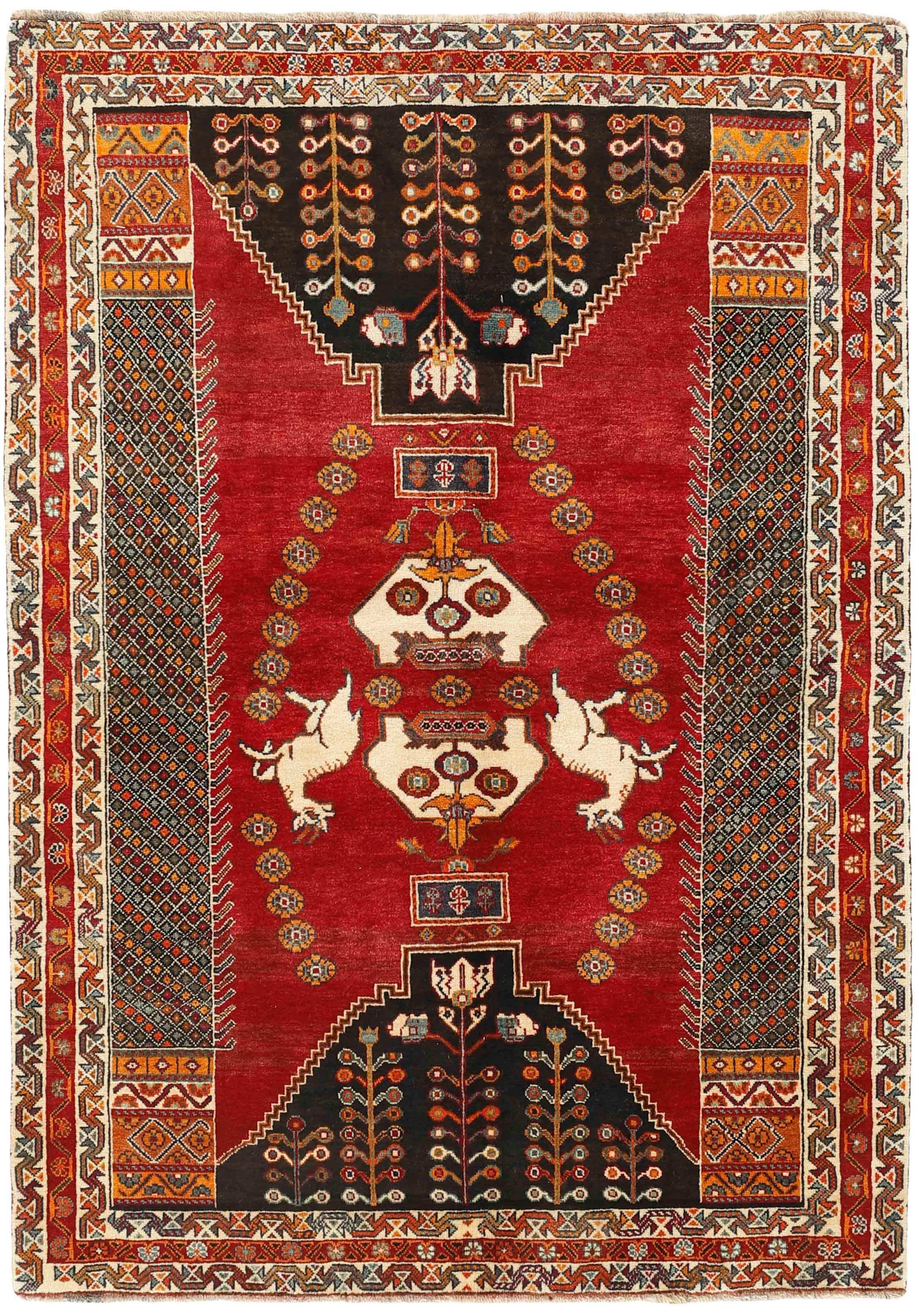 red and black persian rug with geometric design